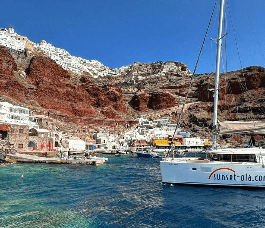 A boat on the water in Santorini.