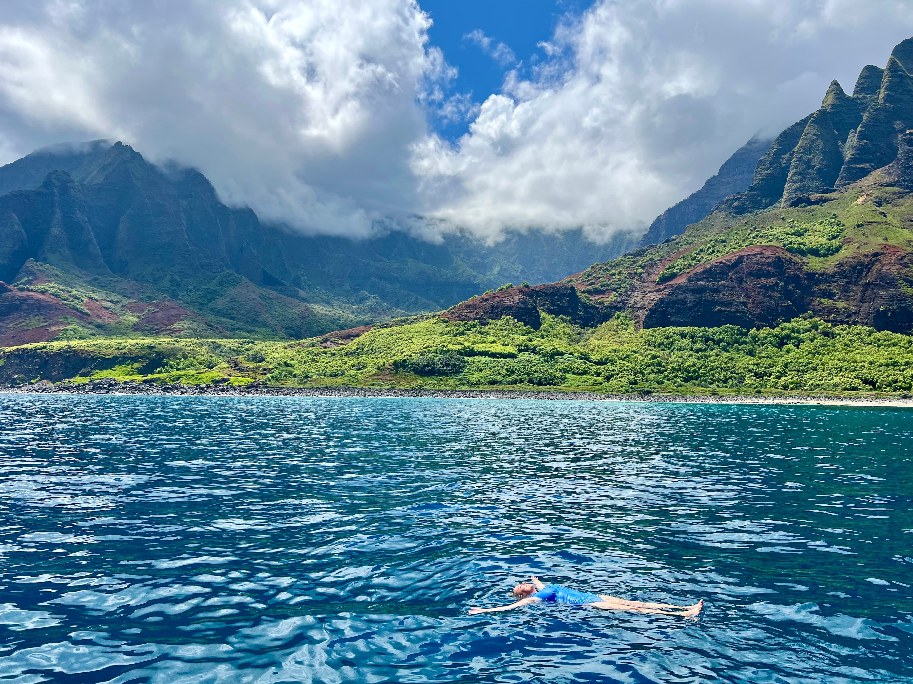 Blue water by the mountains.
