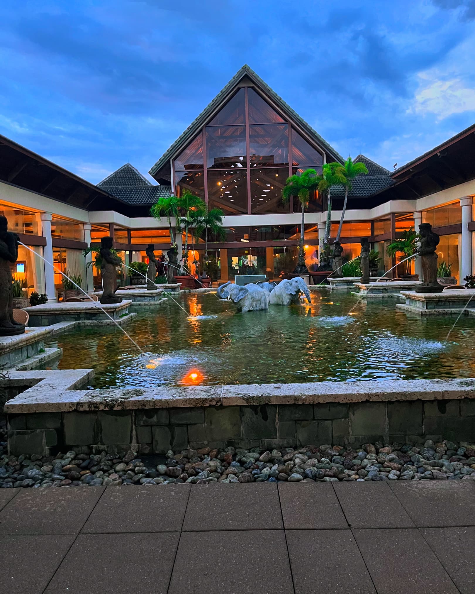 View of a large geometrical pond outdoors in a hotel plaza