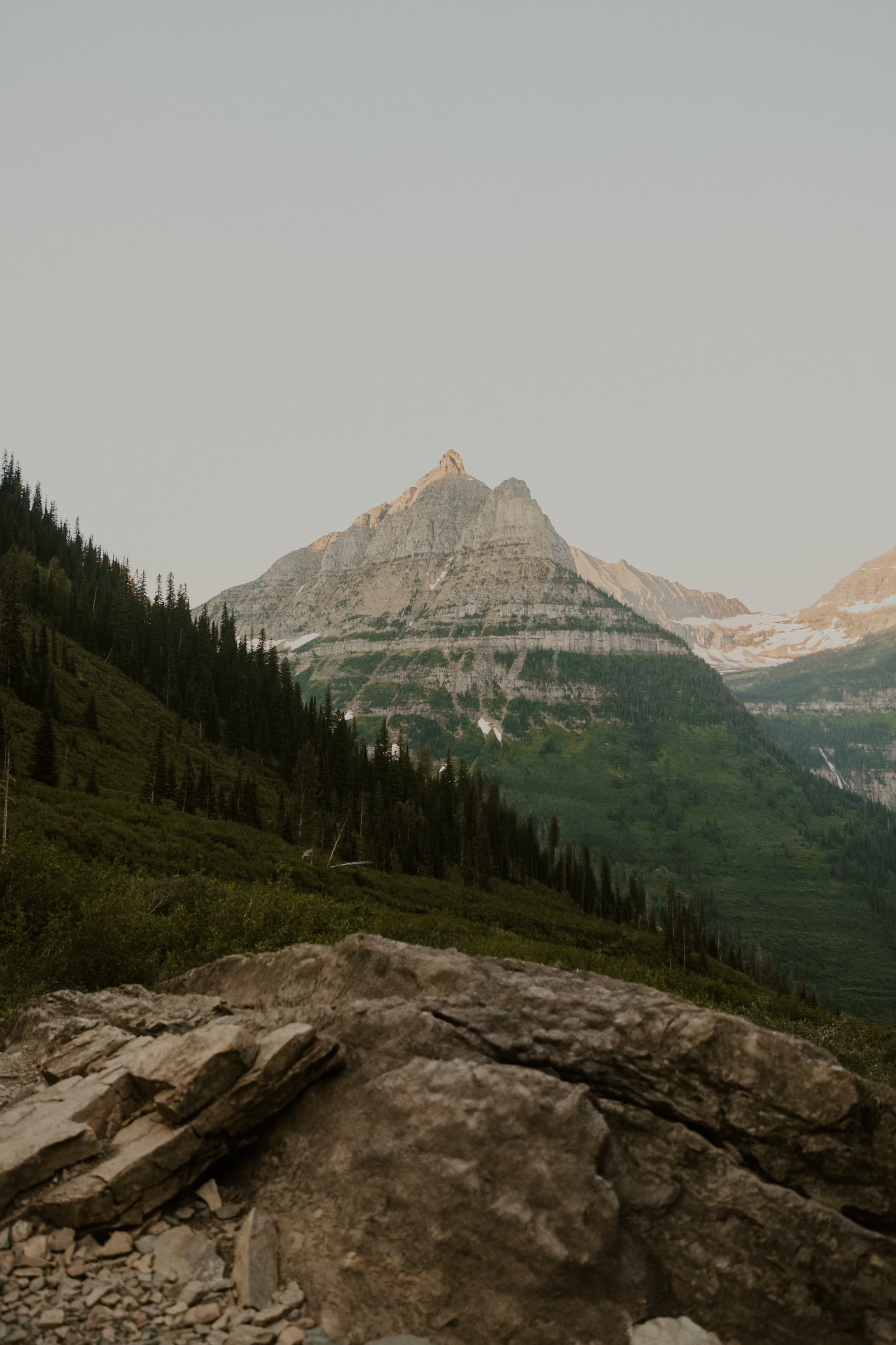View of a mountain range during a hazy day