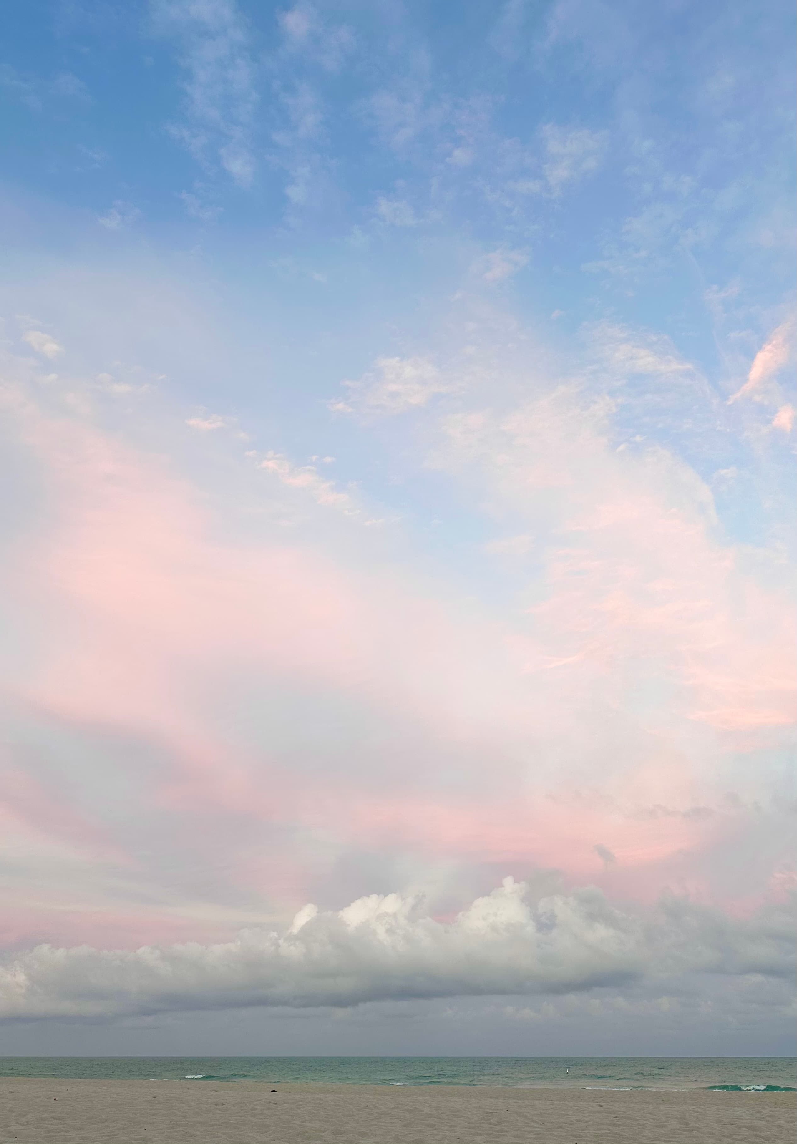Pink skies over the ocean.