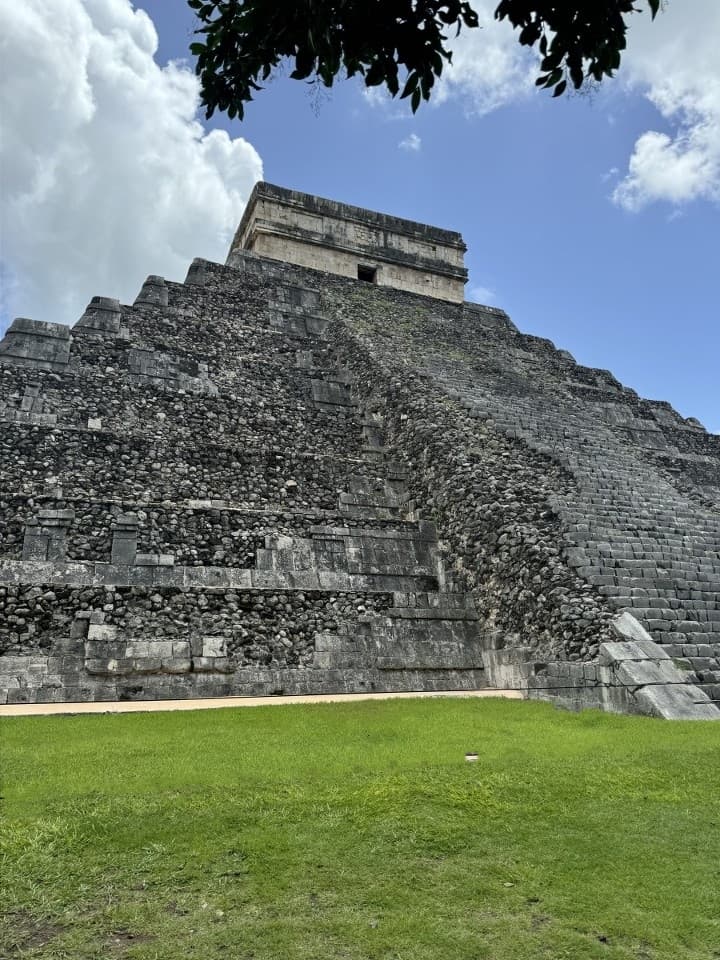 A view of a mesoamerican pyramid from the bottom up.
