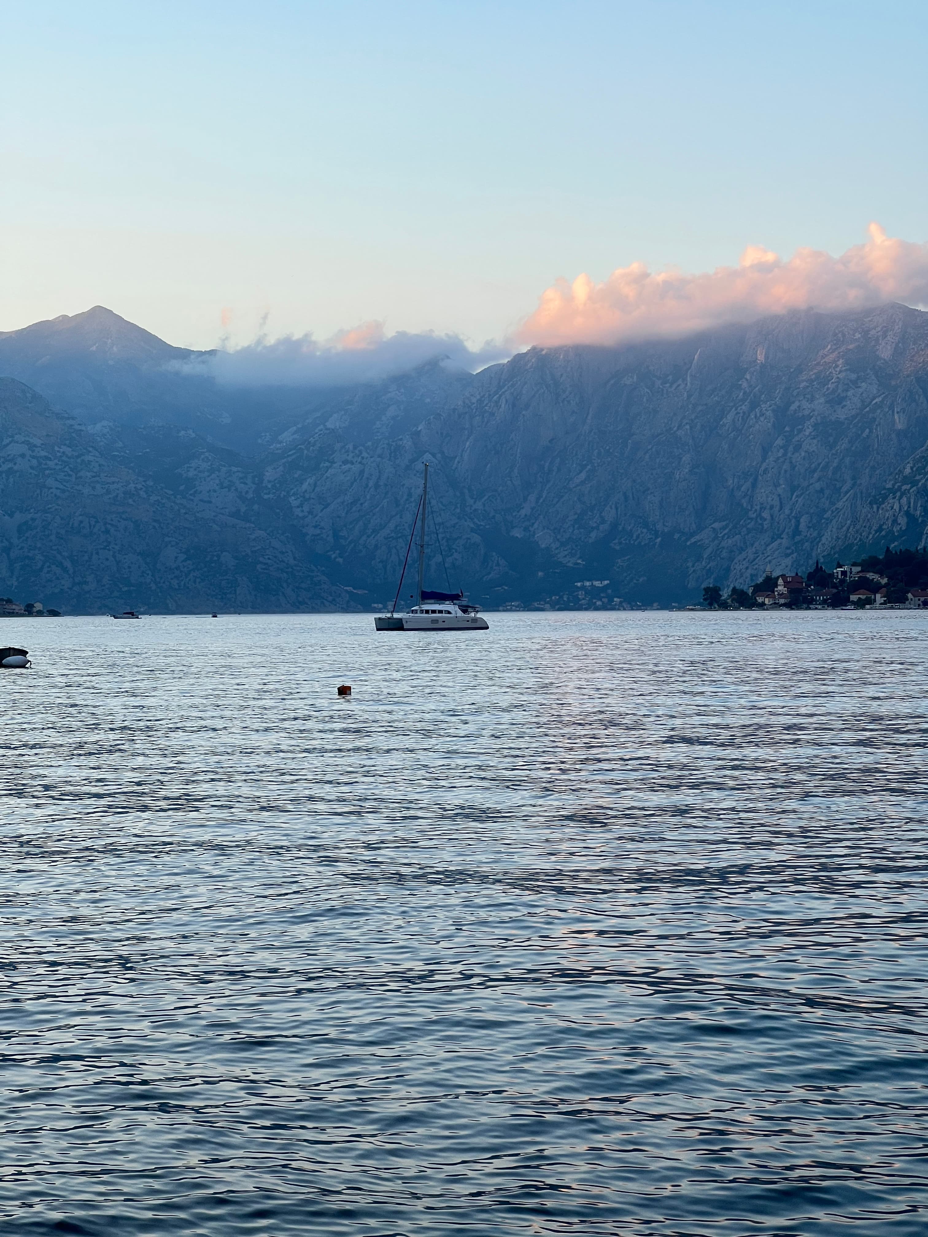 View of the sea and mountains in Kotor Bay, Montenegro at sunset