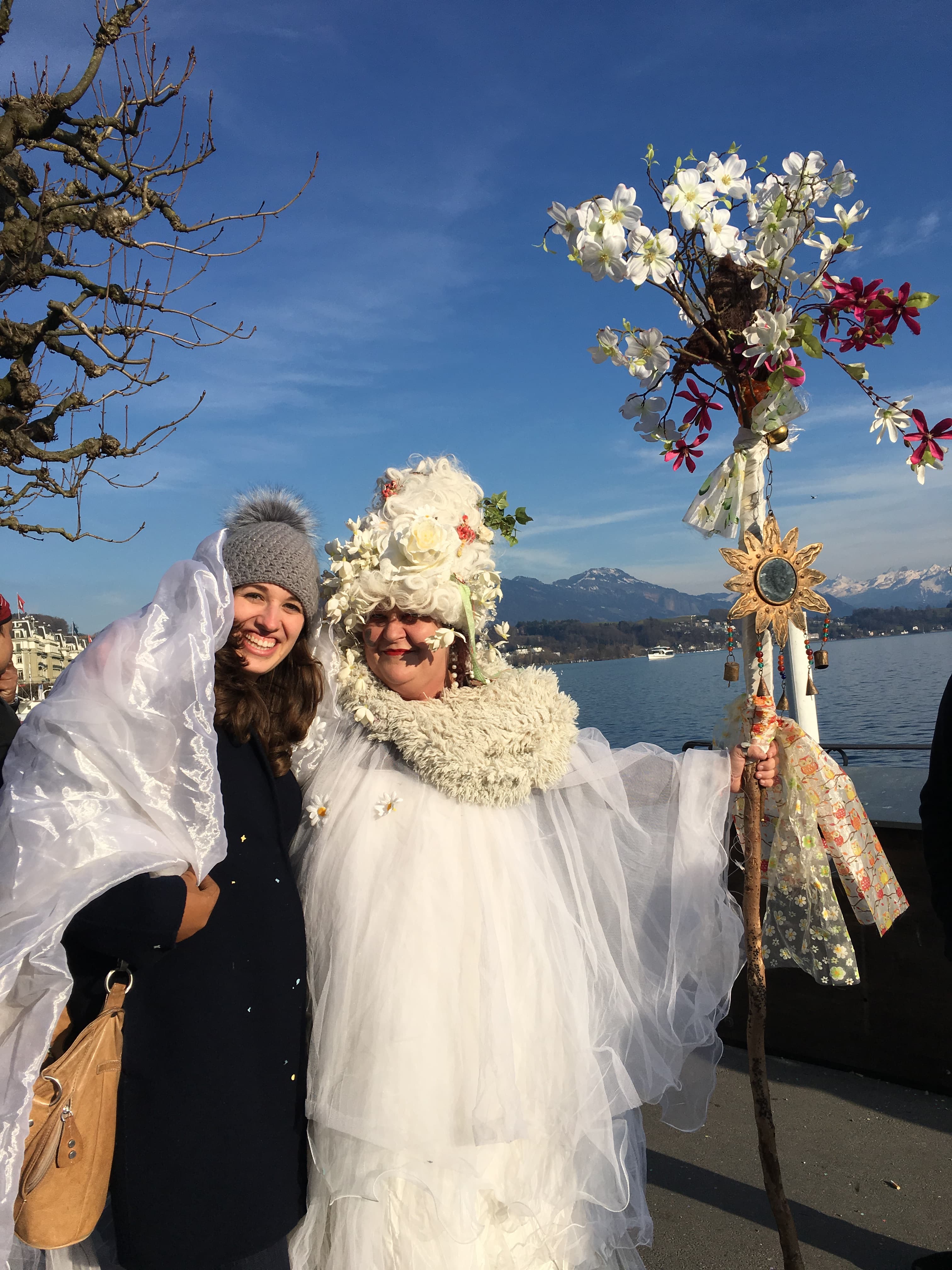 Advisor posing for an image with a person dressed in white.