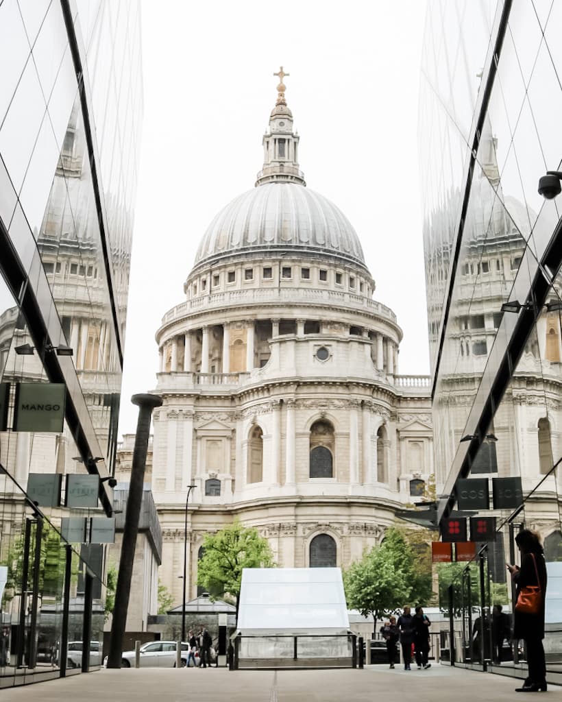 A white stone building with a domed roof.