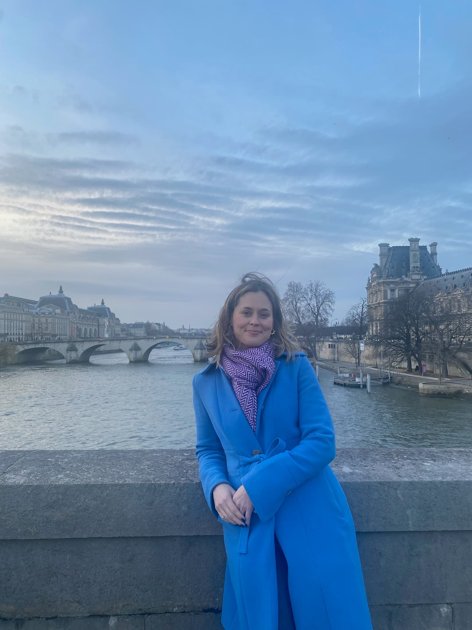 Standing by the lake.