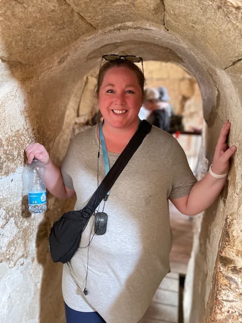 Jenni posing in a tunnel.