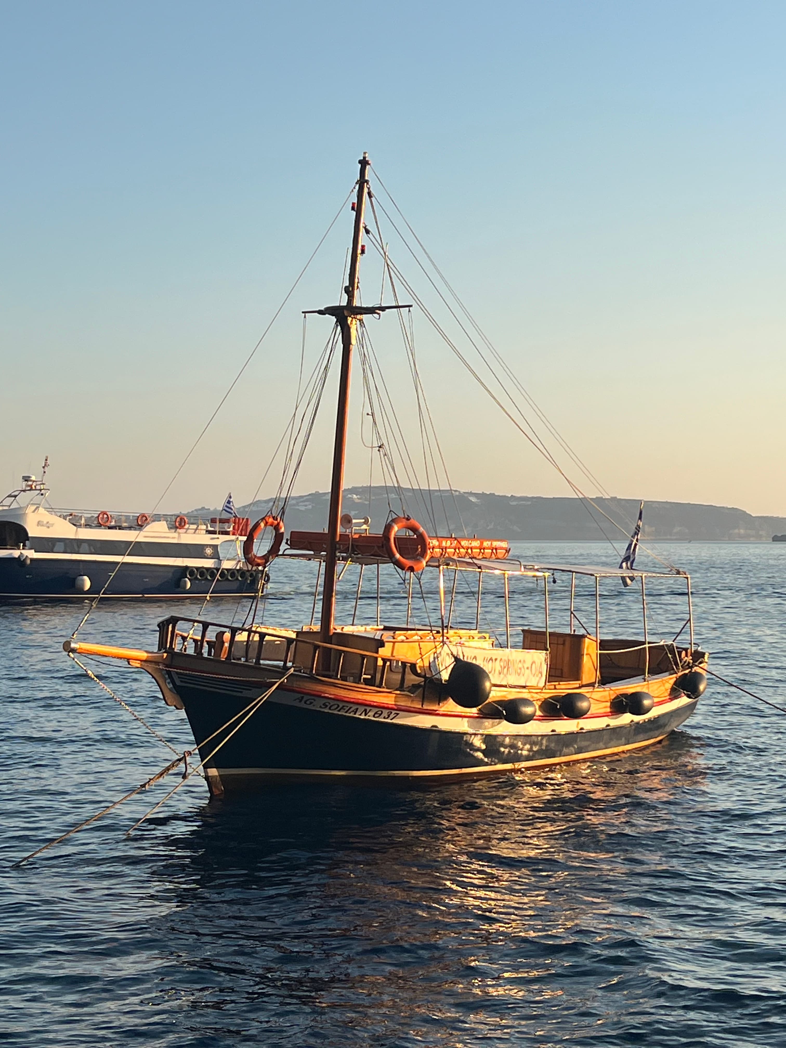 View of a sailboat at sea during sunset