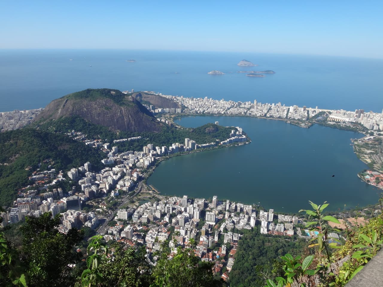 An aerial view of a beach side town during the daytime.