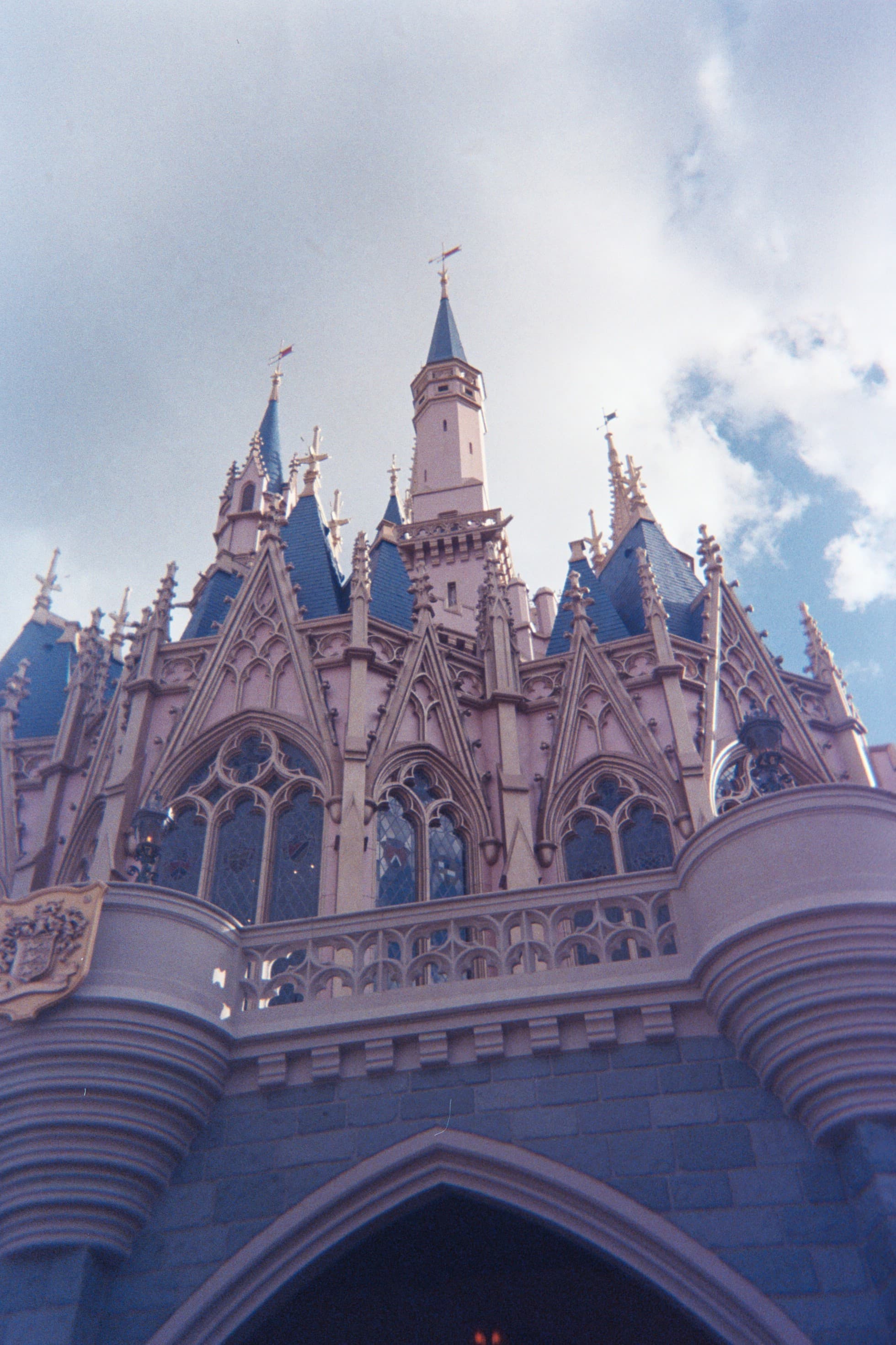 View from the bottom of Cinderella’s castle at Disney World on a sunny day