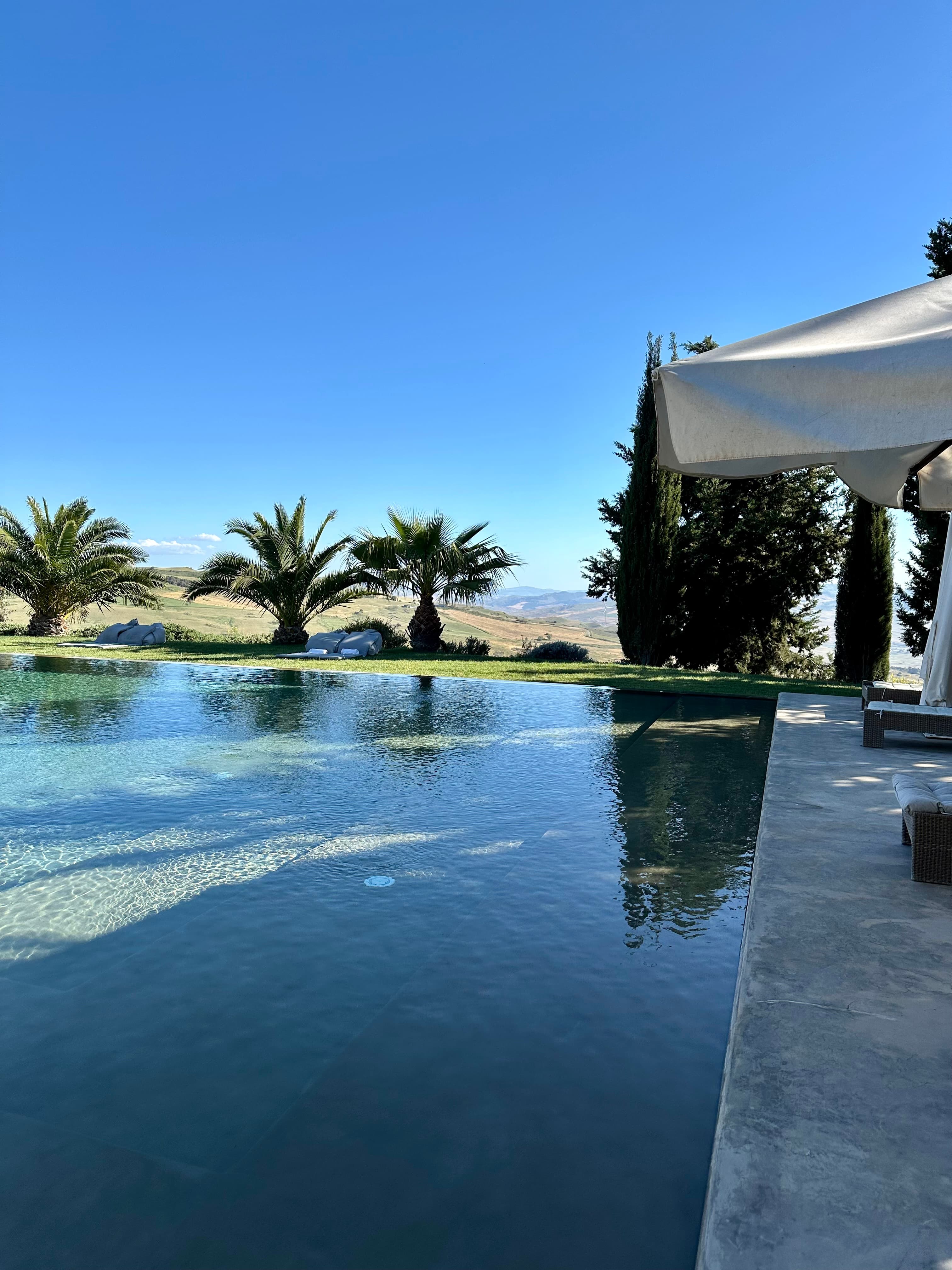 Blue skies over water.