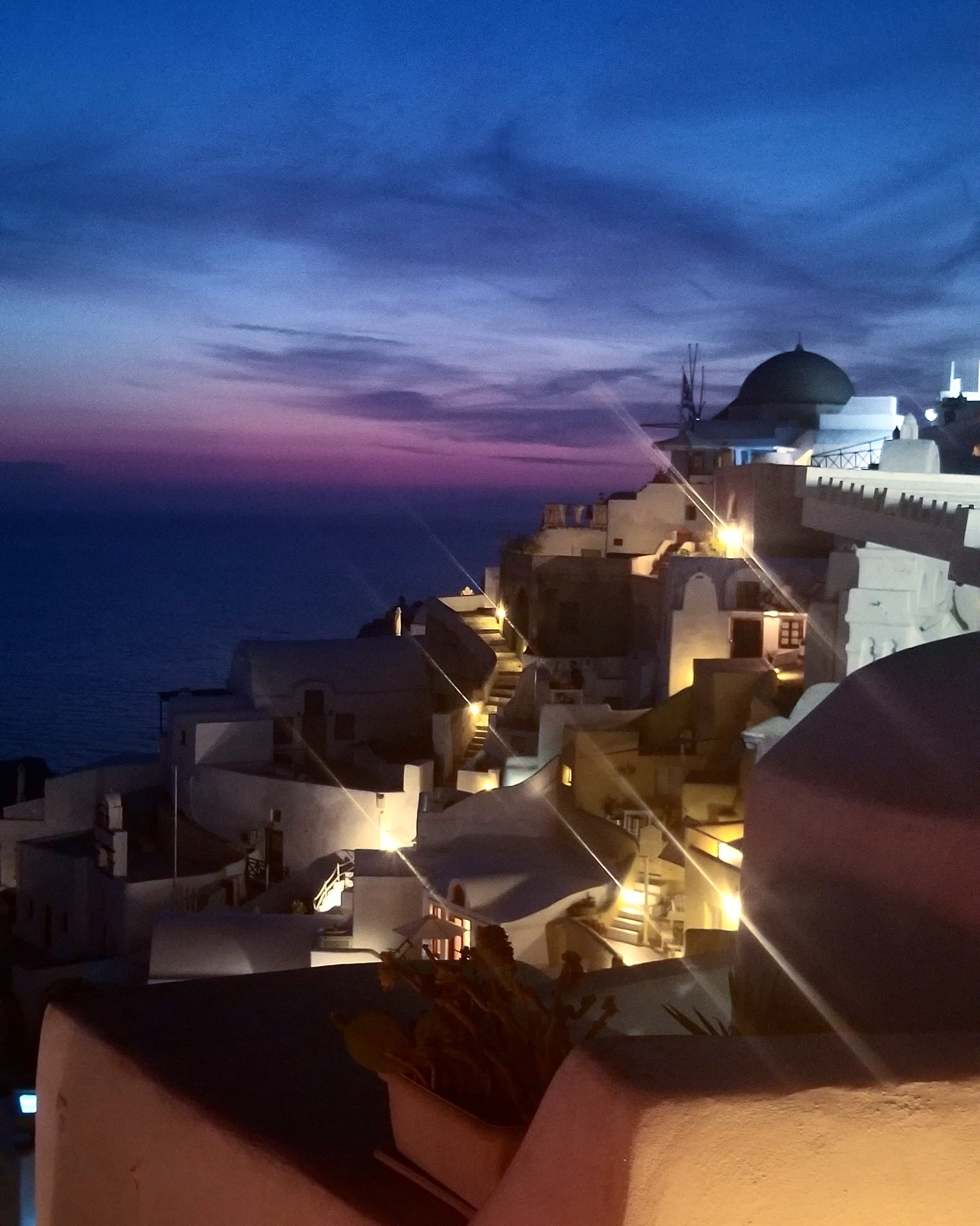 View of buildings in Santorini at dusk
