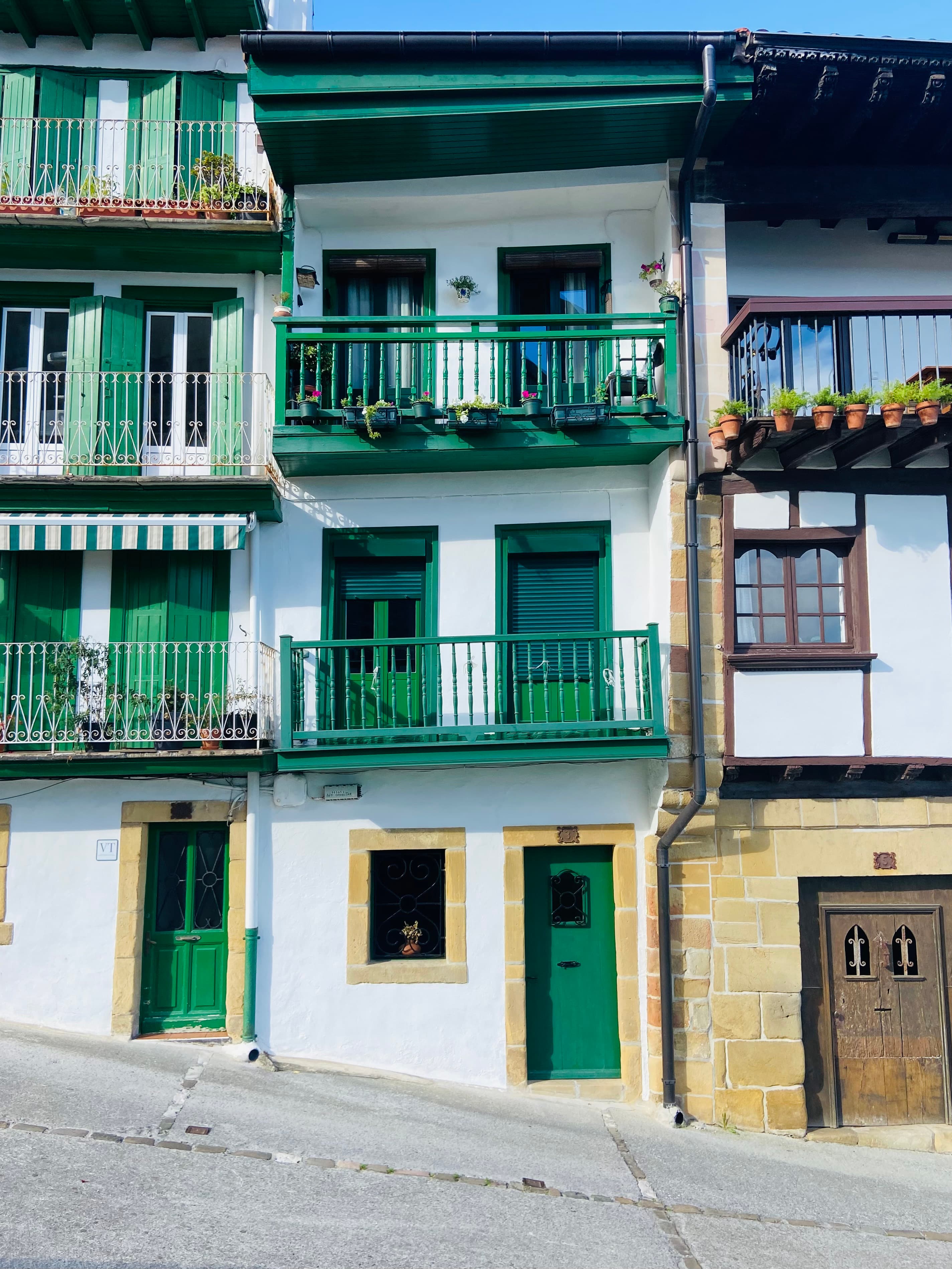 White and green buildings.