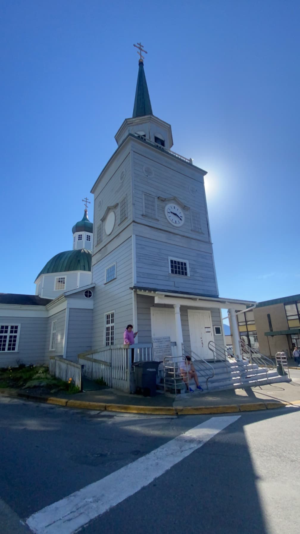 View of a small, old church tower on a sunny day