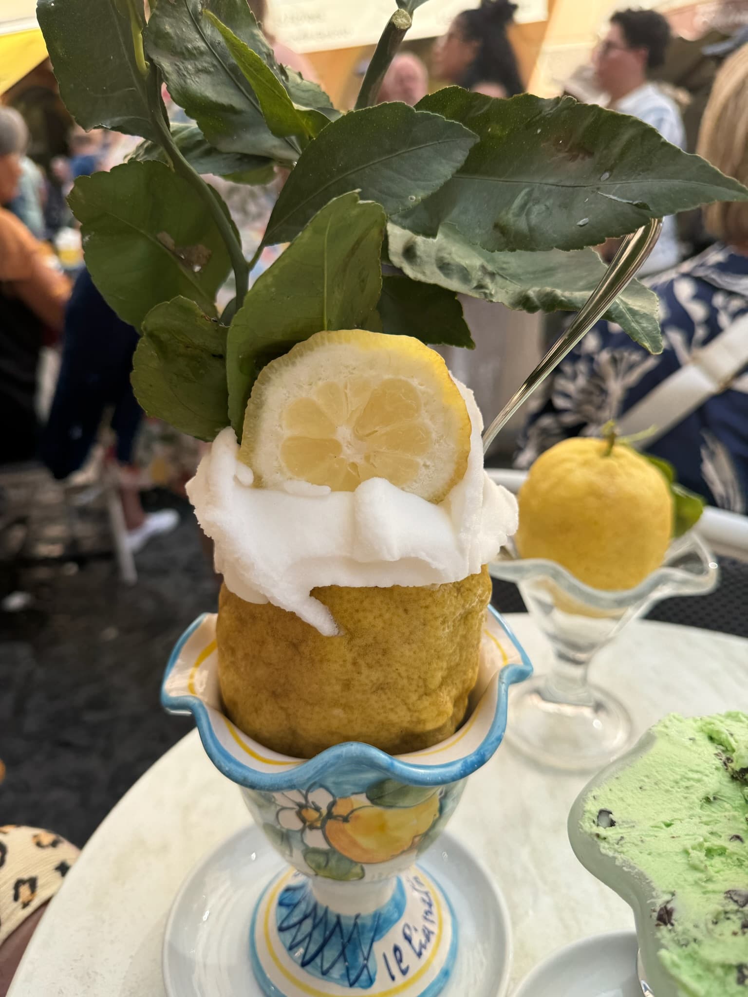 View of a lemon sorbet inside a carved out lemon