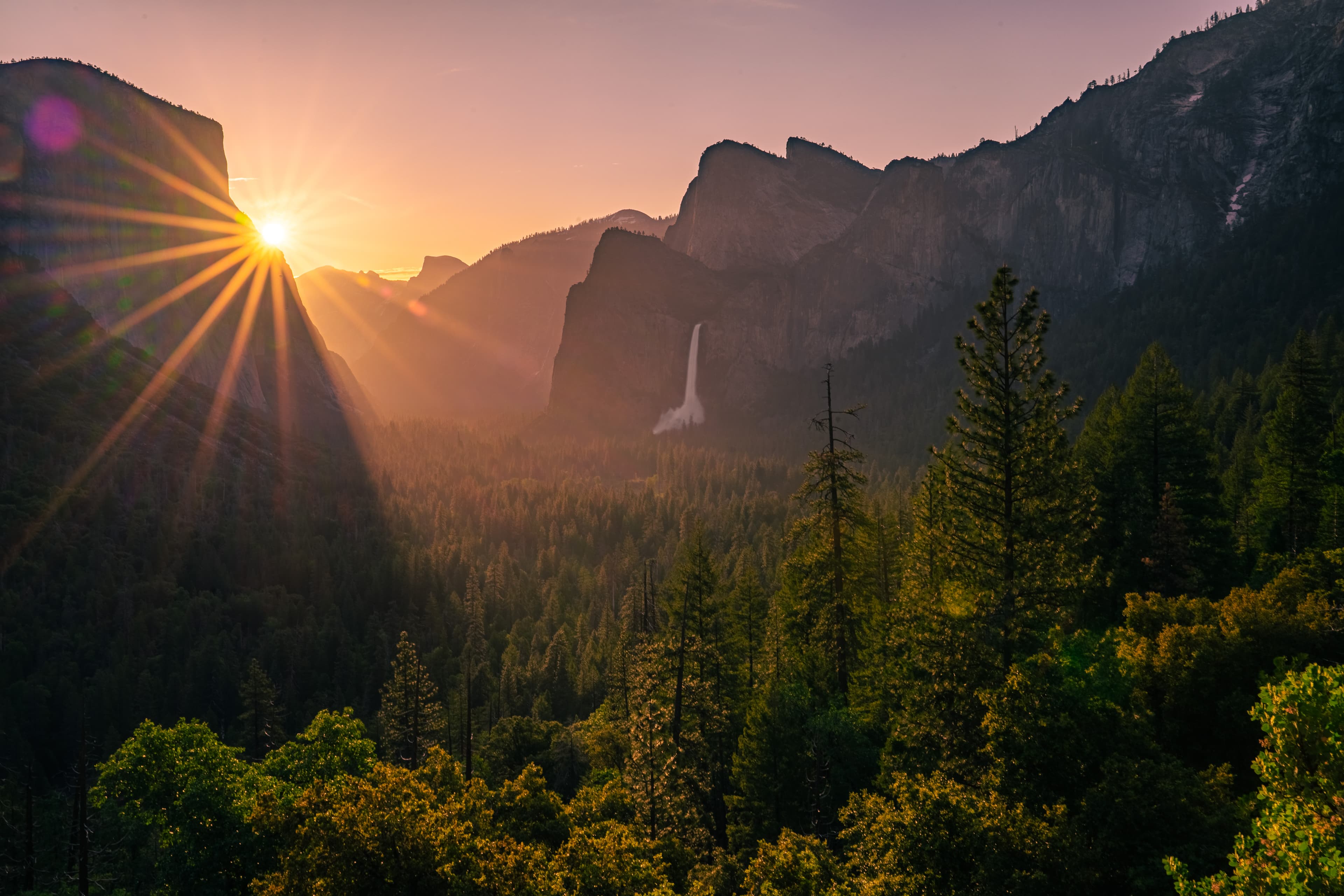 View of beautiful sunset light over a valley in the mountains