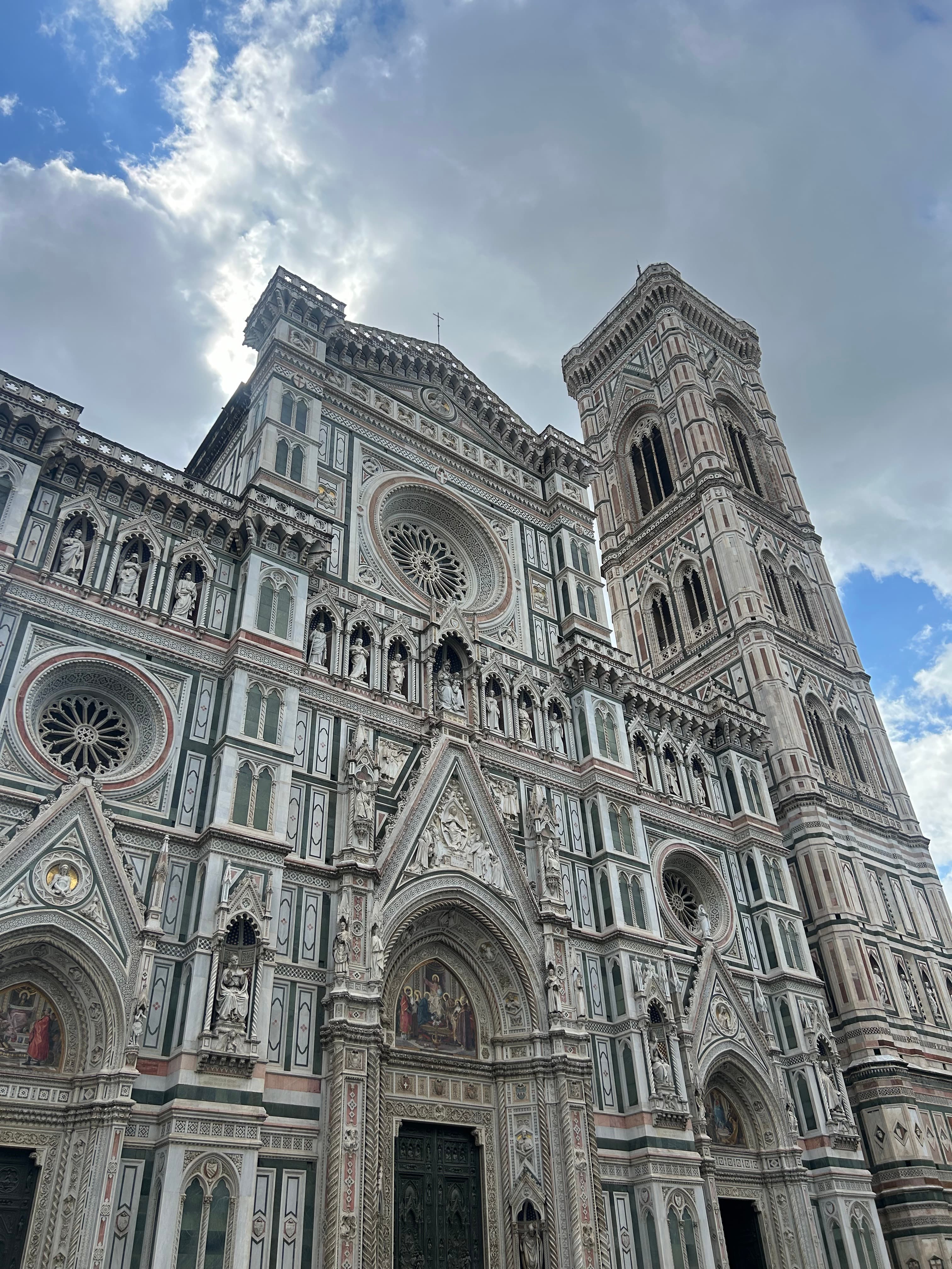 The magnificent Duomo in Florence, Italy, featuring its distinctive dome and beautiful Renaissance architecture.