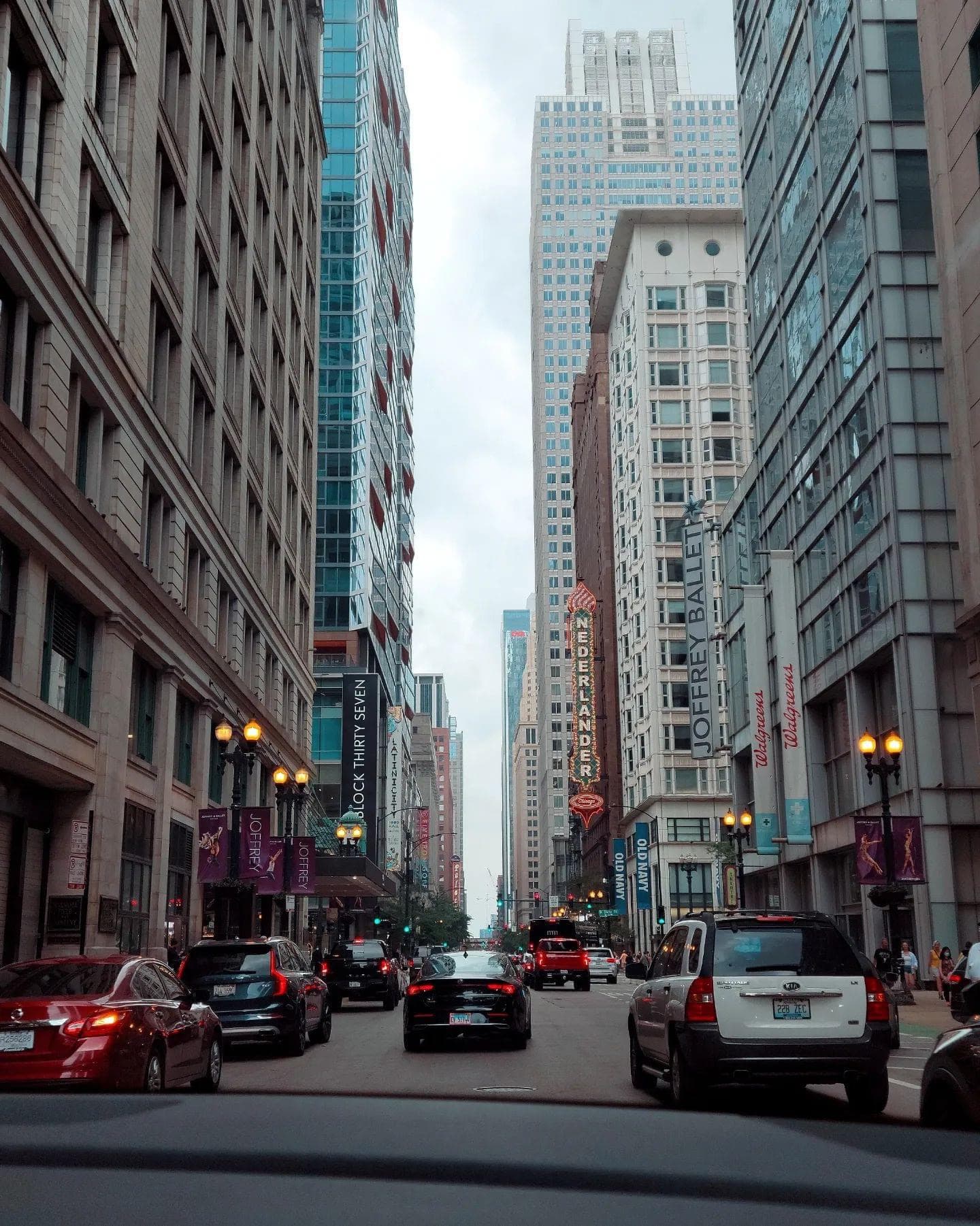 View from a car of a New York City street on a cloudy day