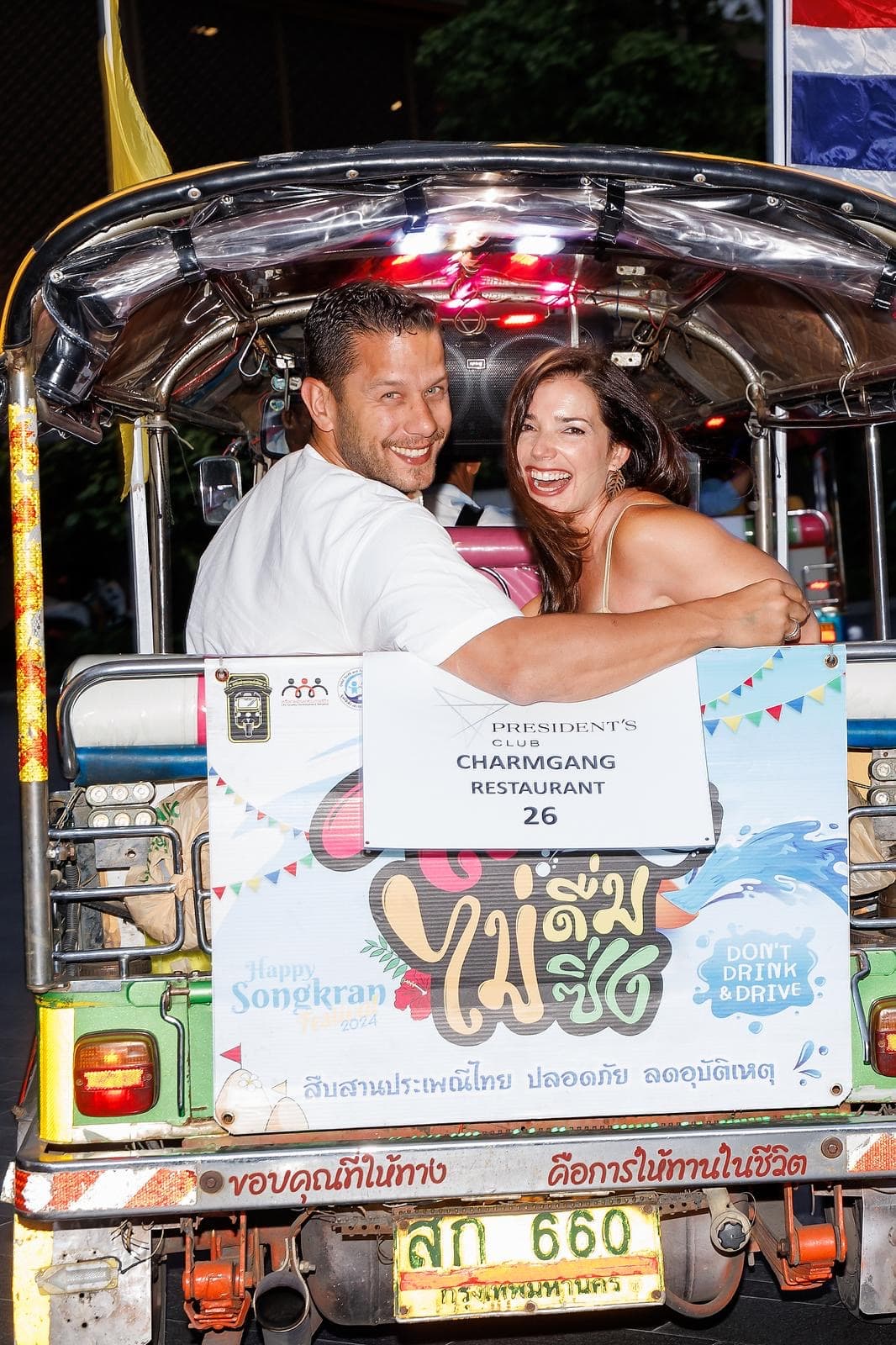 Looking out of a tuk tuk.