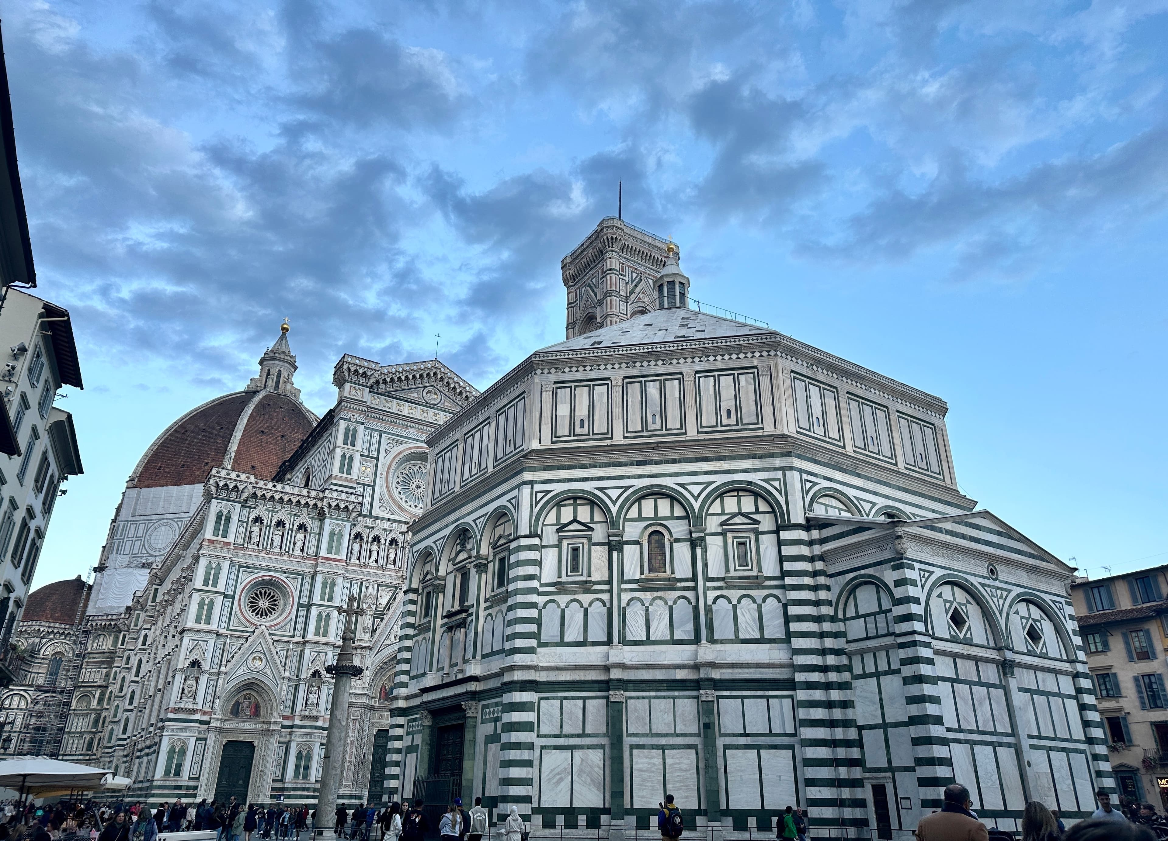 Exterior view of a large cathedral at dusk