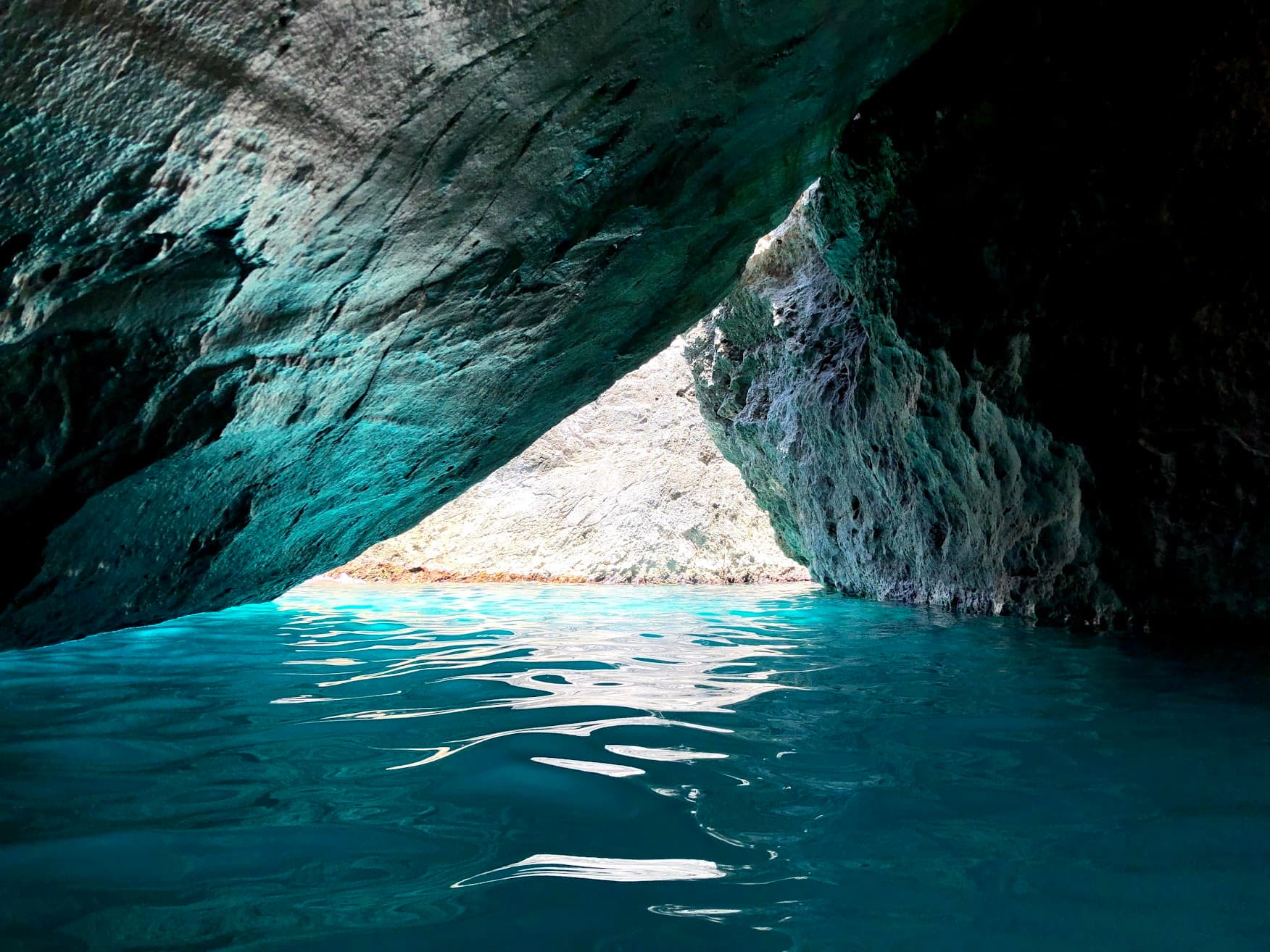Blue lake through the rocks.