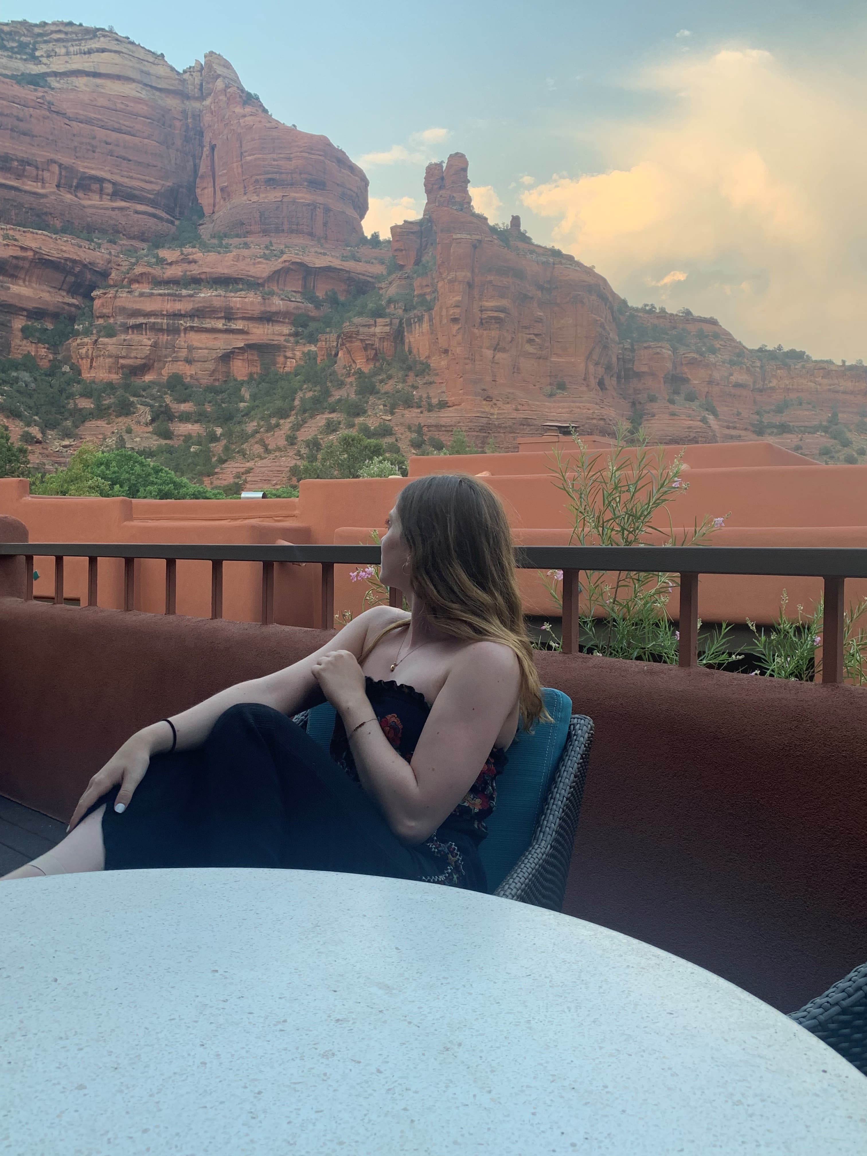 Author pictured in front of mountain range in Southwest USA