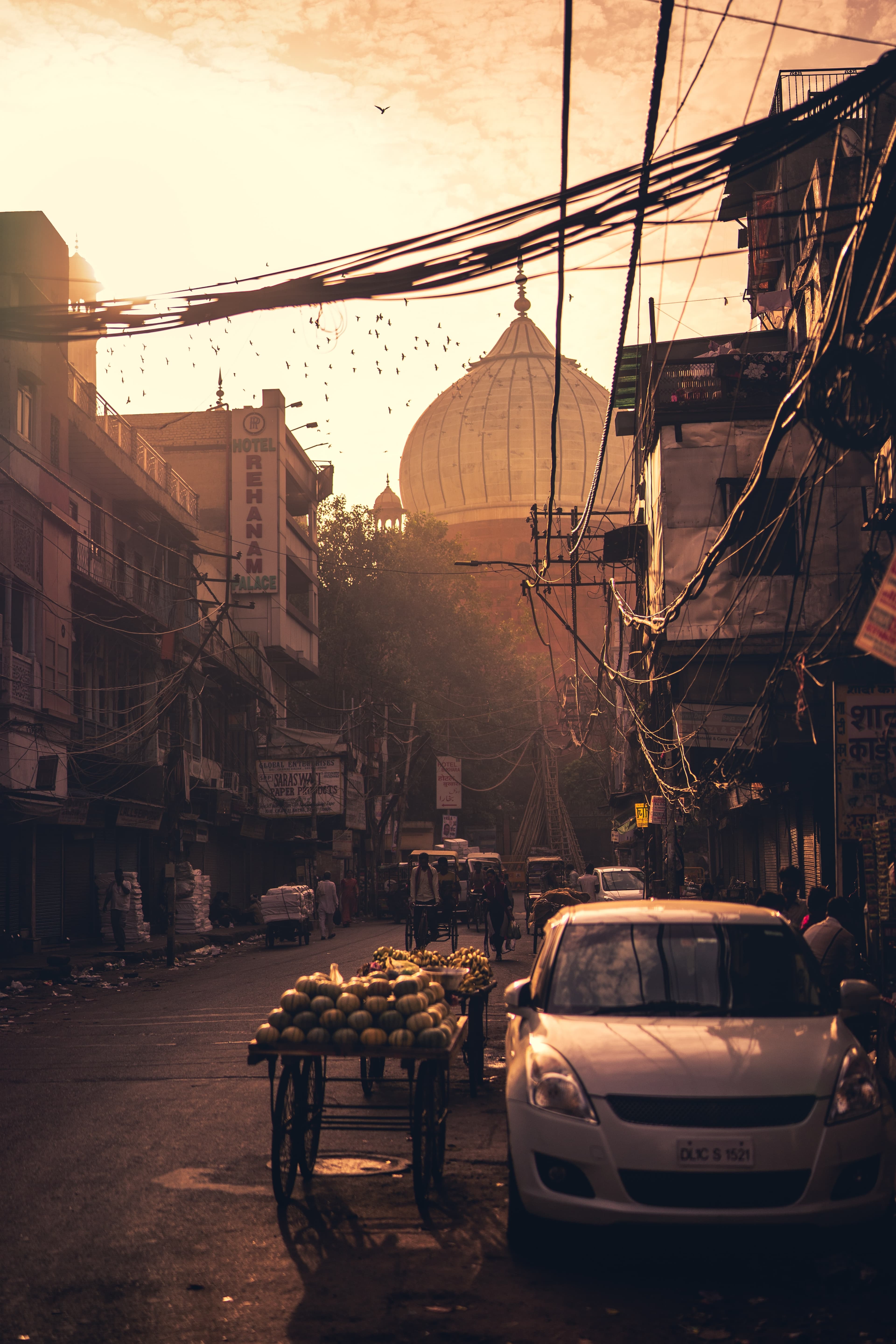 View down a street with carts and cars