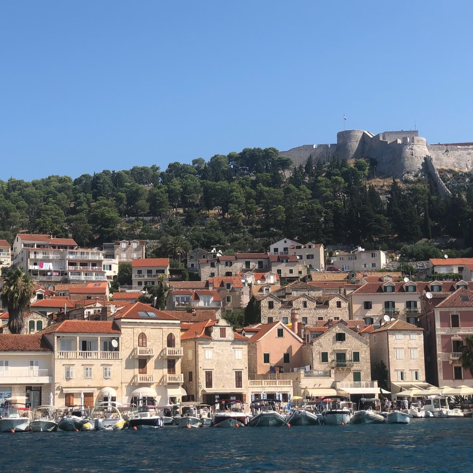 Water body with buildings on the shore.
