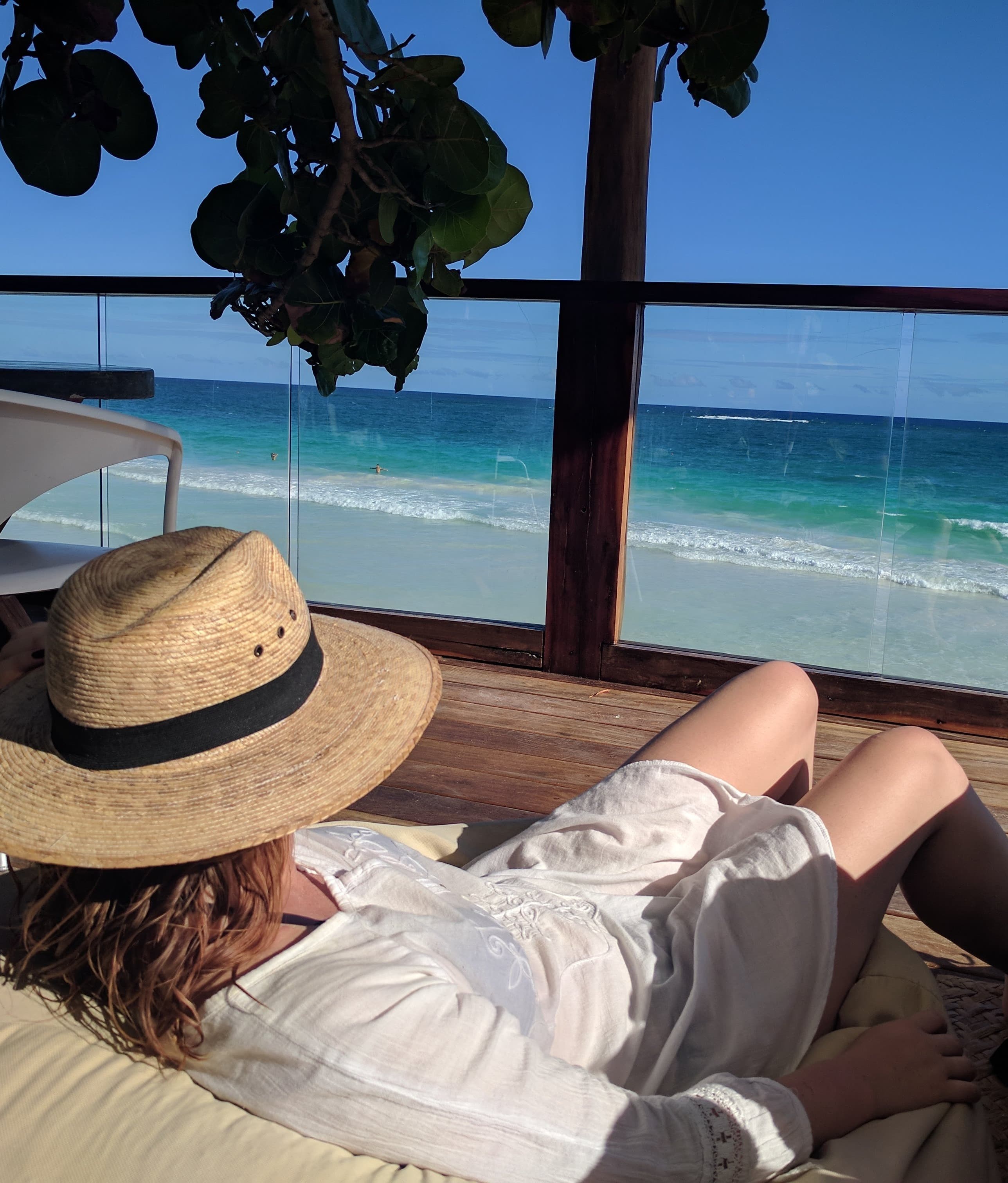Lounging at a mezzanine hotel patio in Tulum.