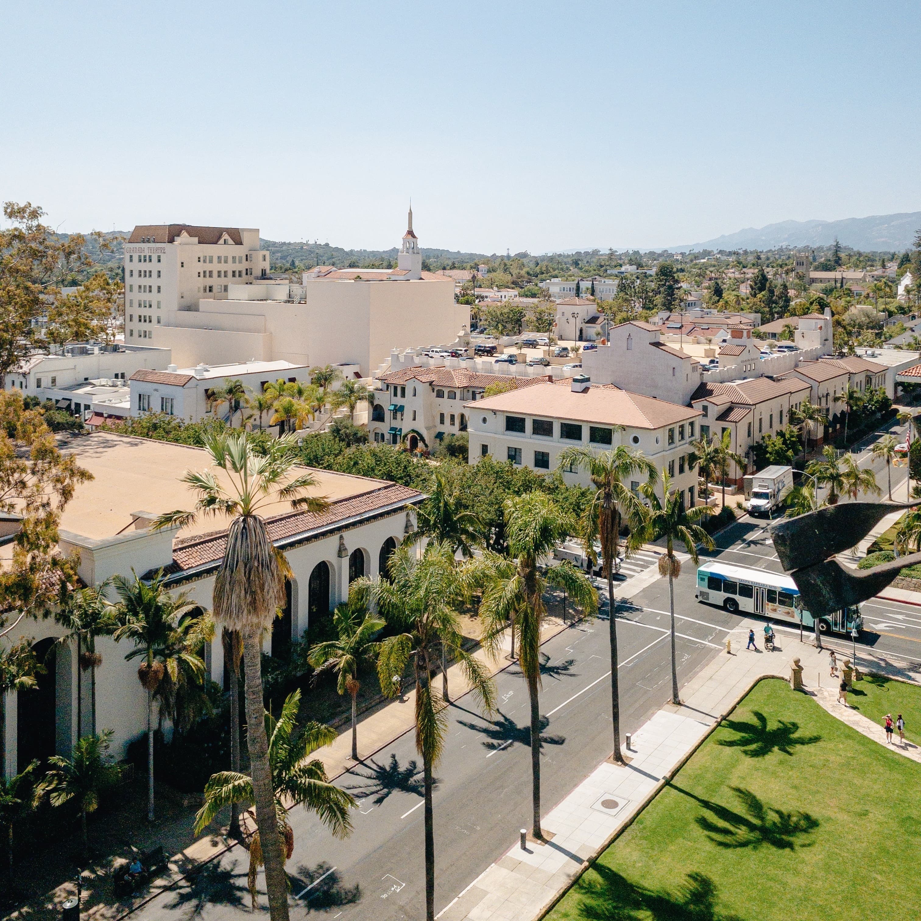 Colonial buildings and palm trees in Santa Barbara.