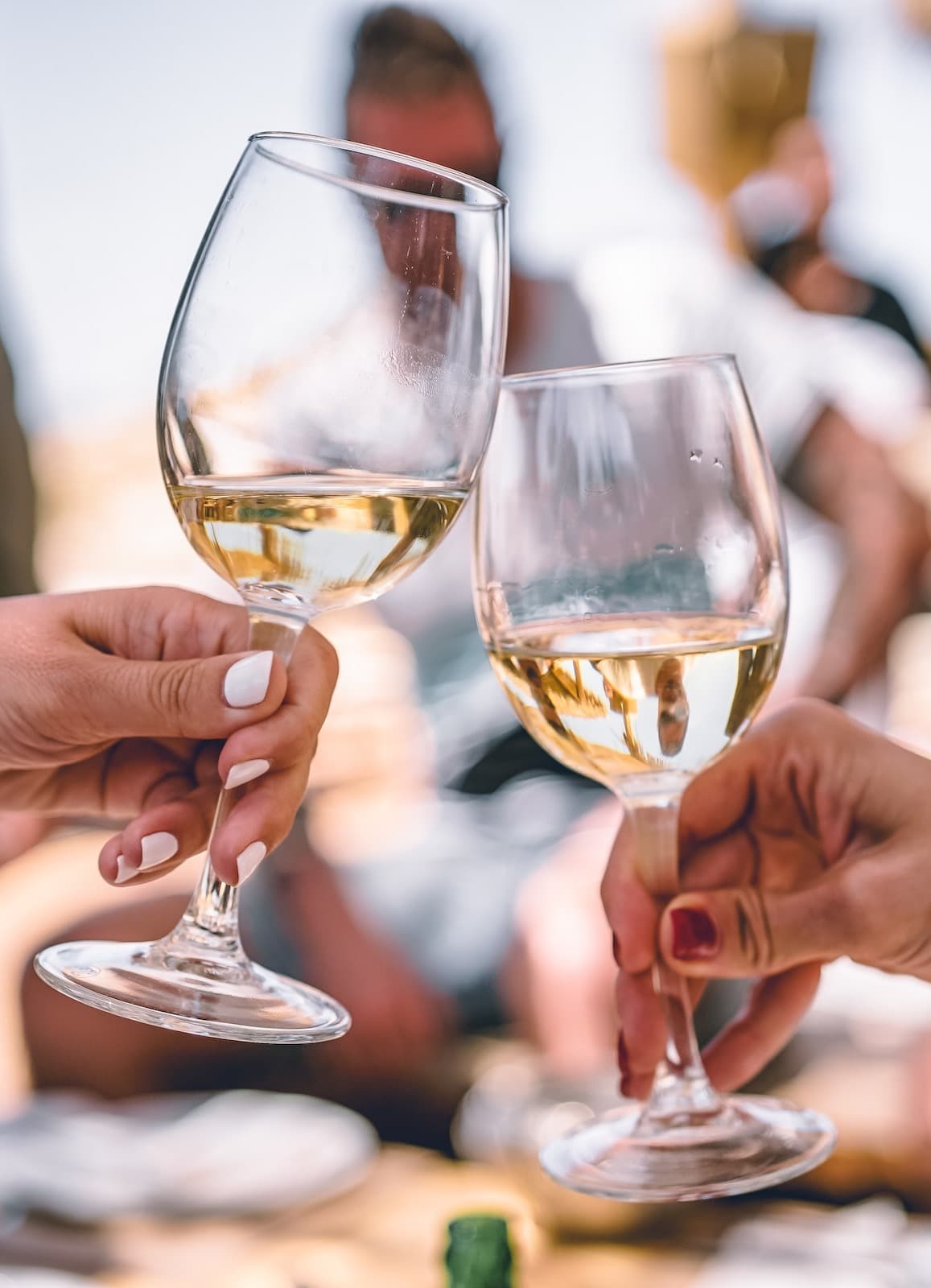 Holding glass of champagnes.