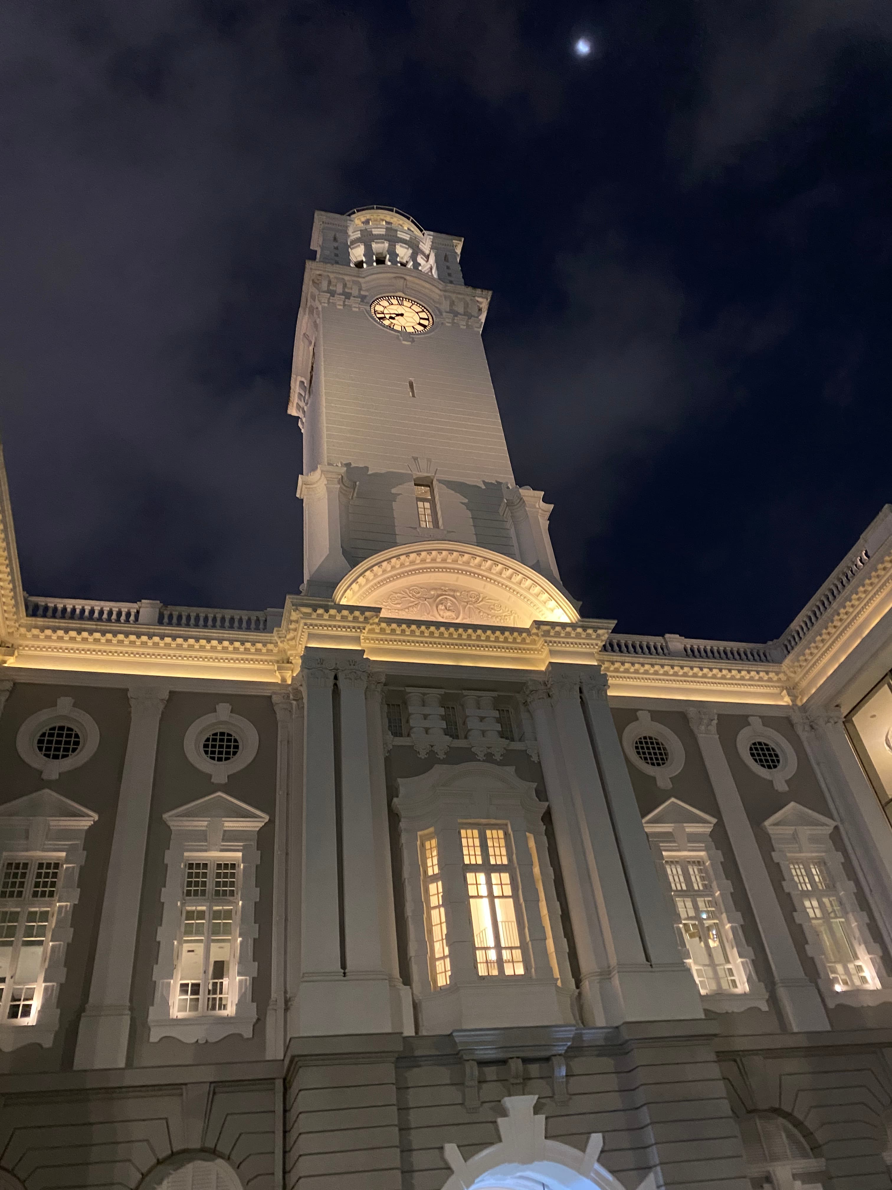 A low-angled building with a clock tower