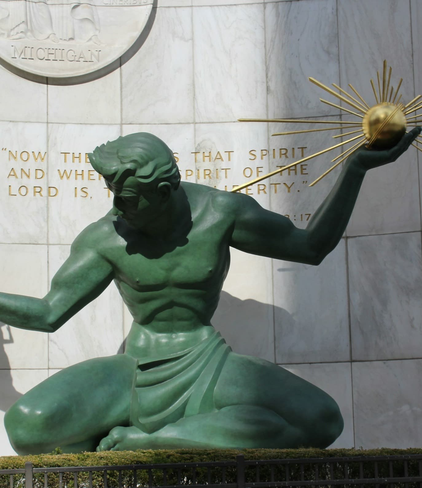 Green statue of a man - Spirit of Detroit statue