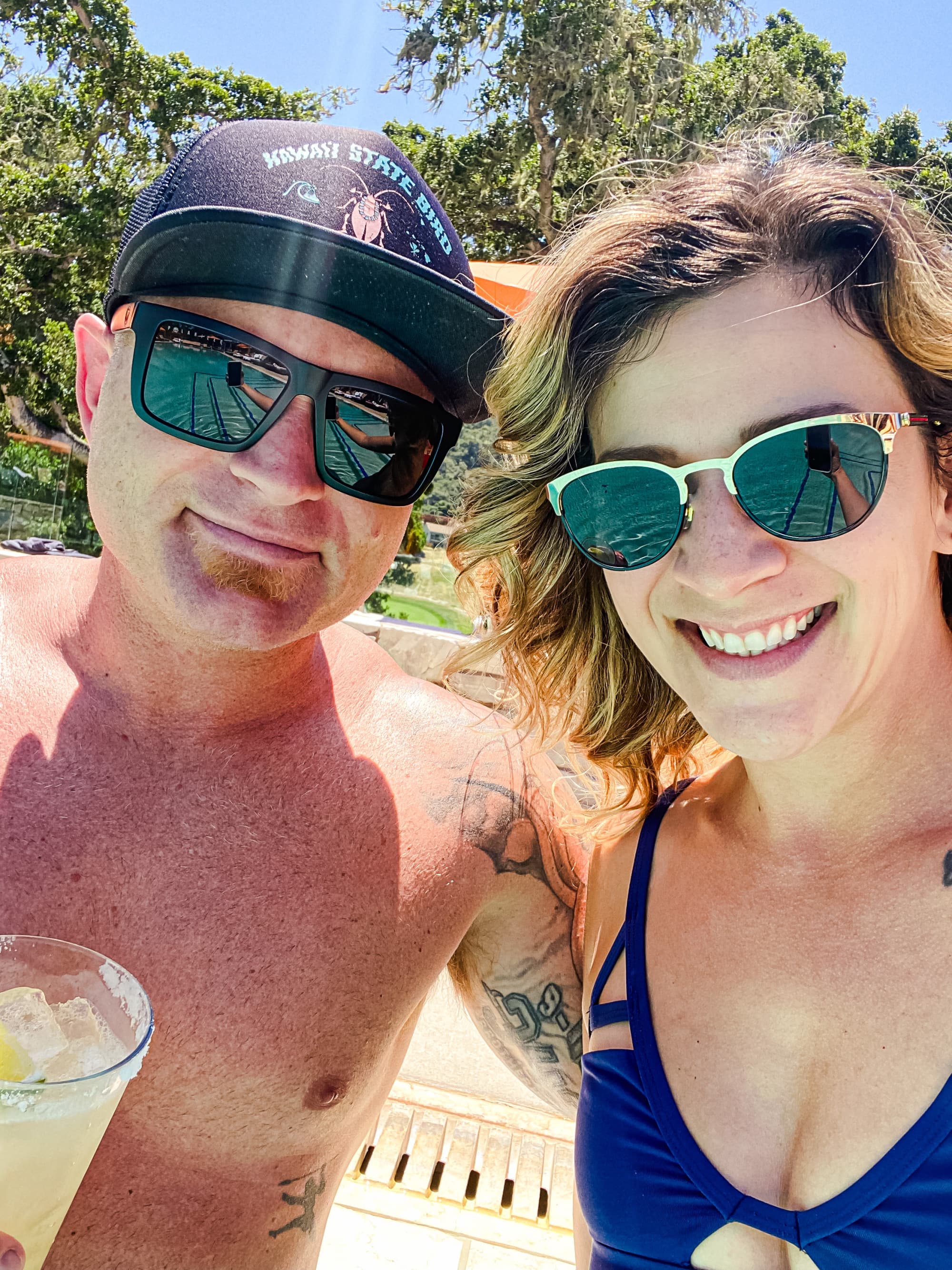 Two people posing in front of the camera