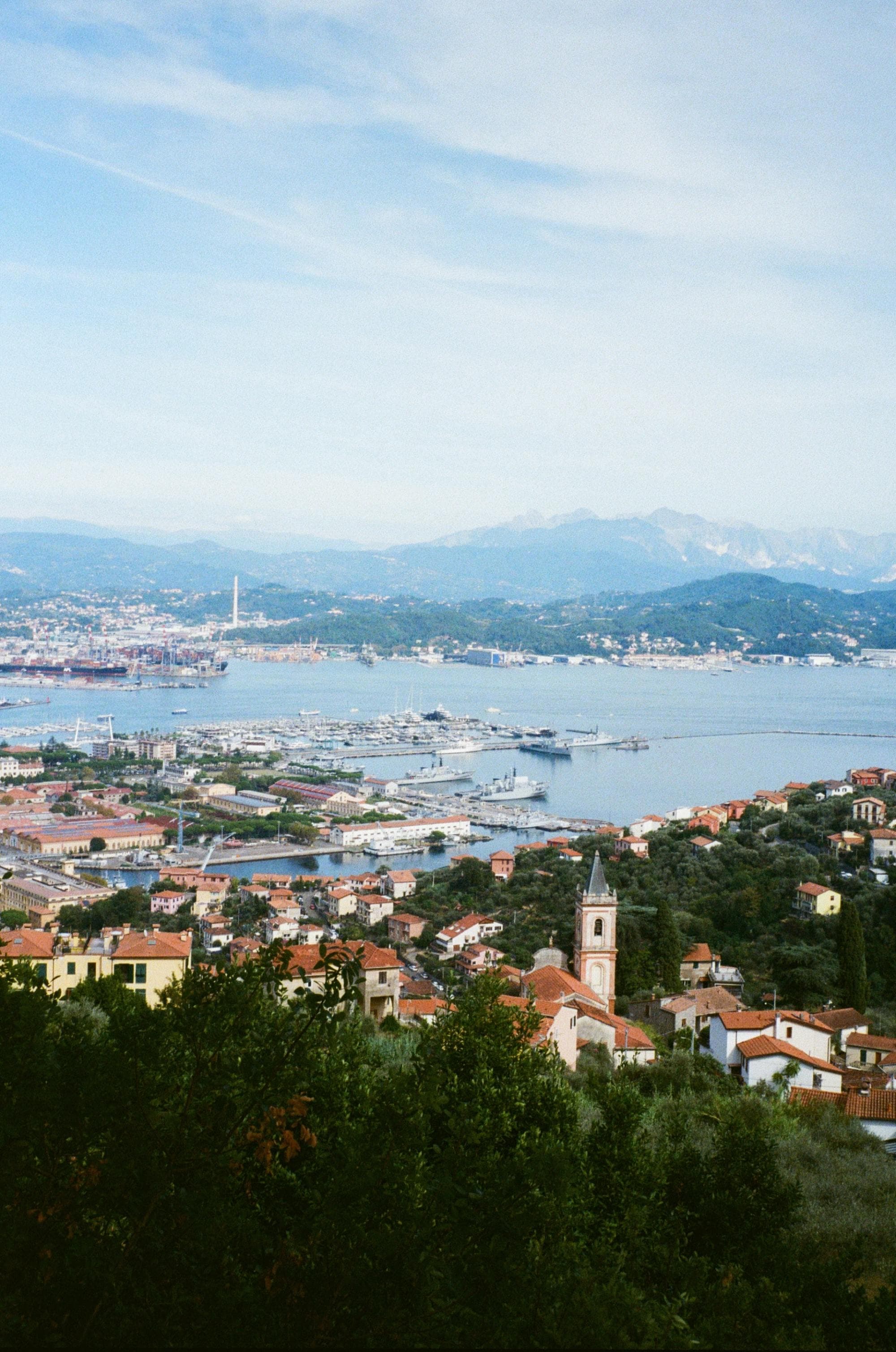 An aerial view of La Dolce Vita Italy with sea and buildings.