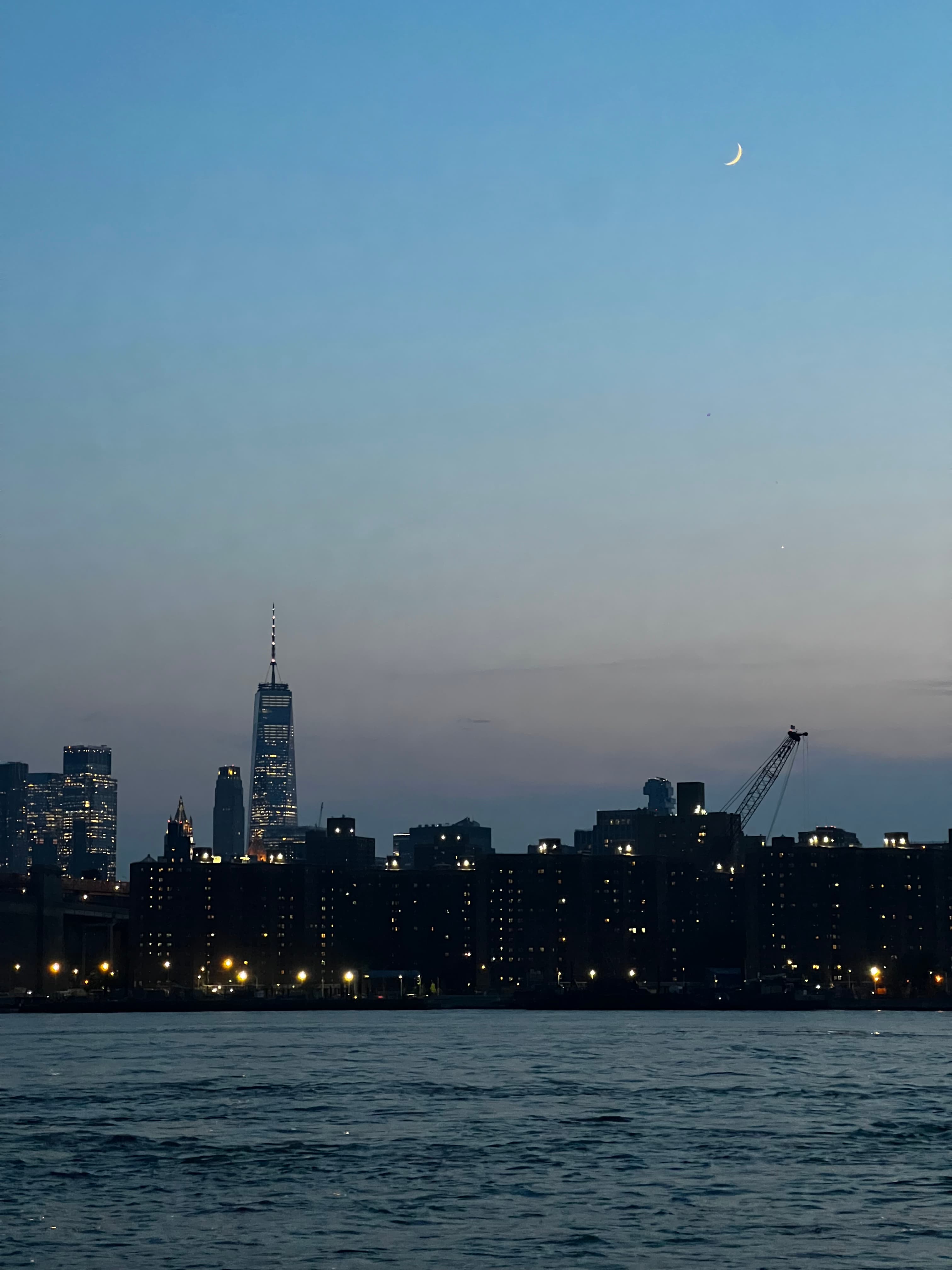NYC skyline from across the East River after sunset