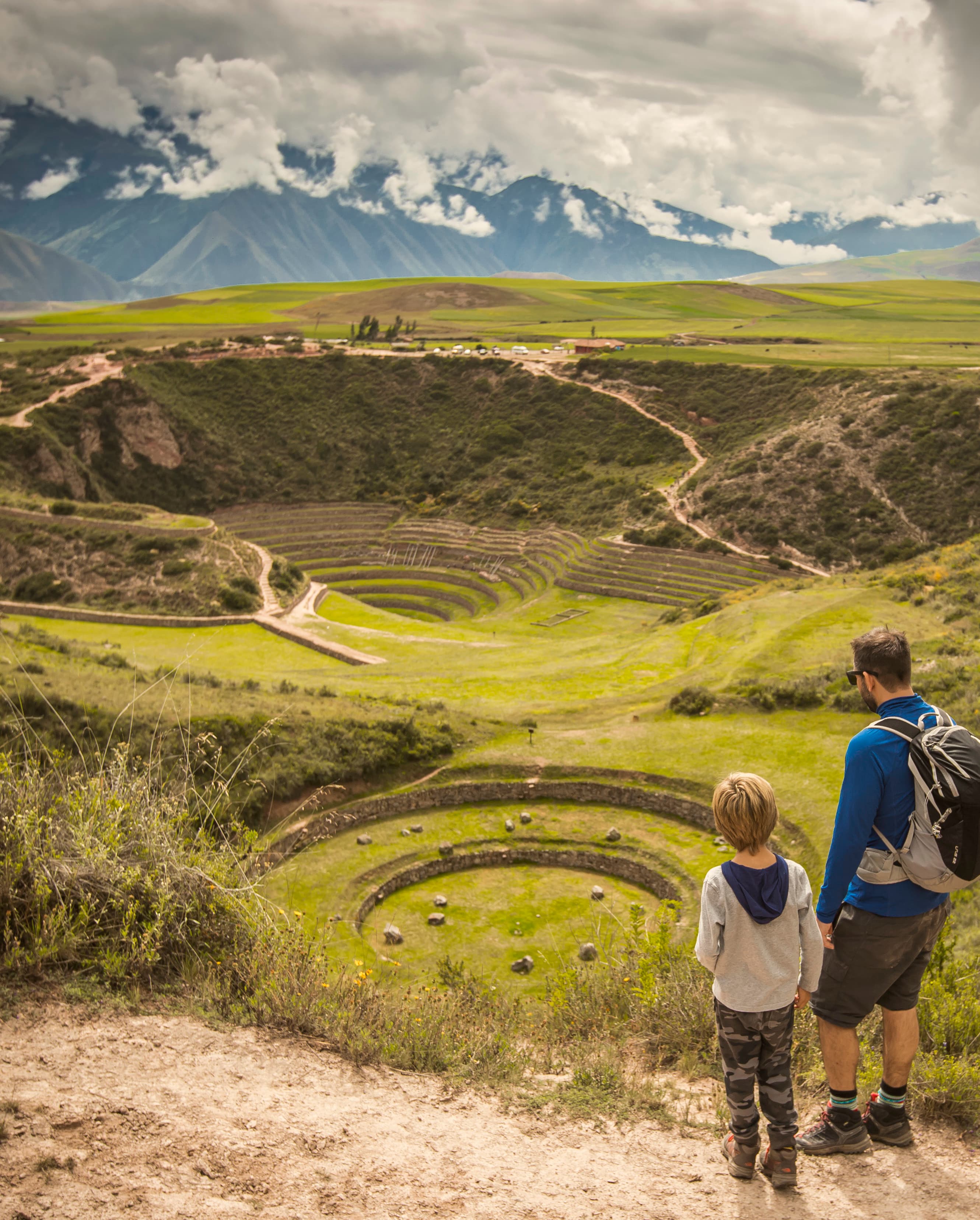 A guy with a child in countryside