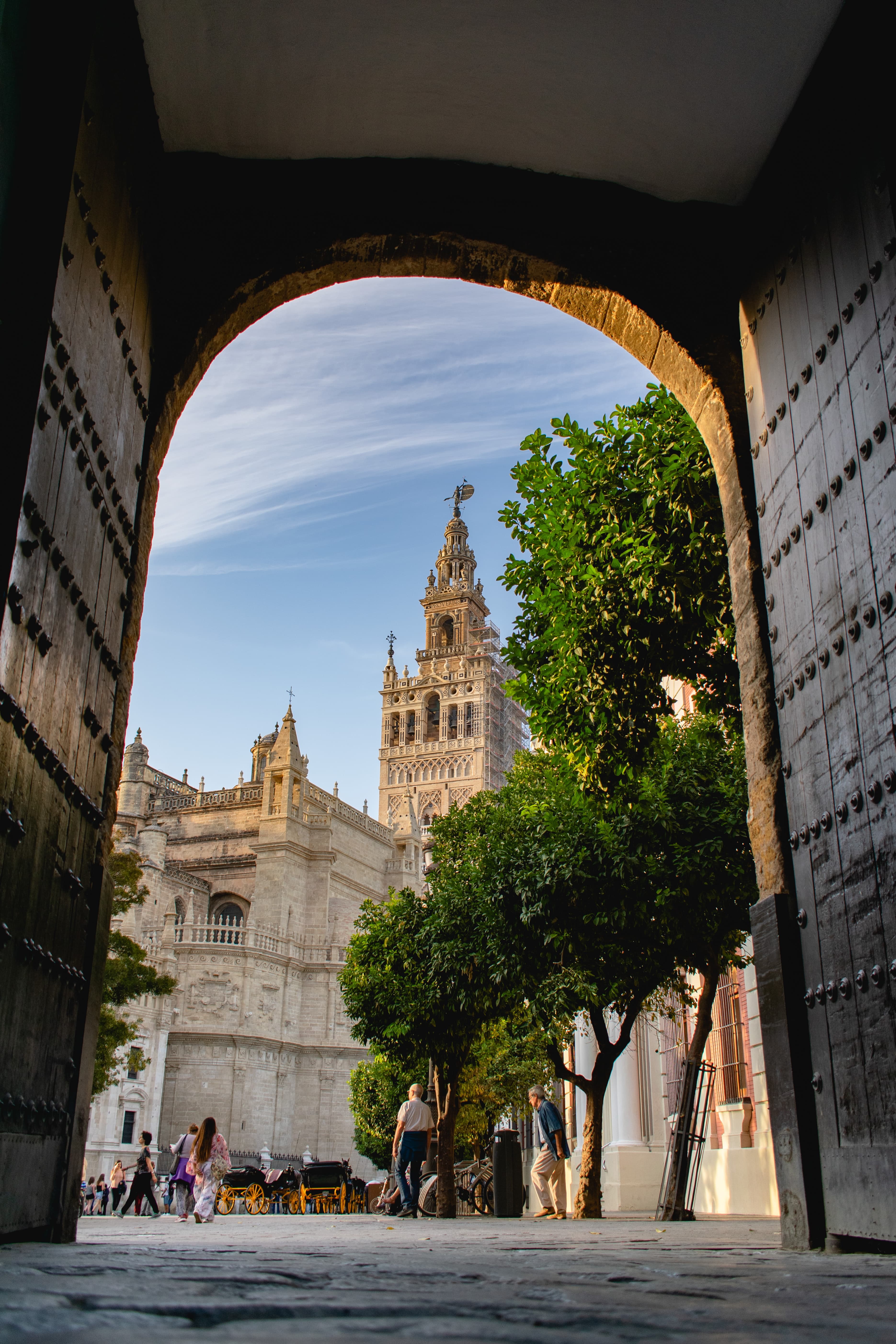 tall archway with building during daytime