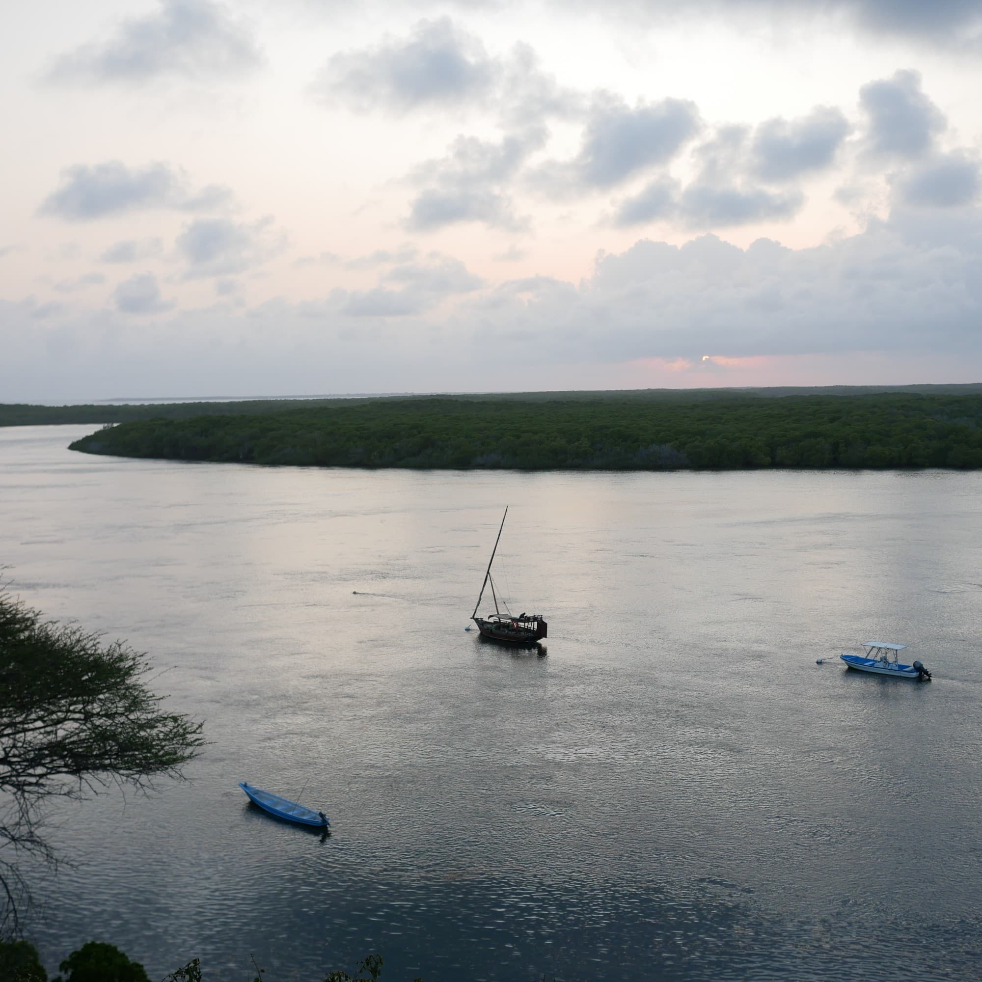 View of lake with kayaks.