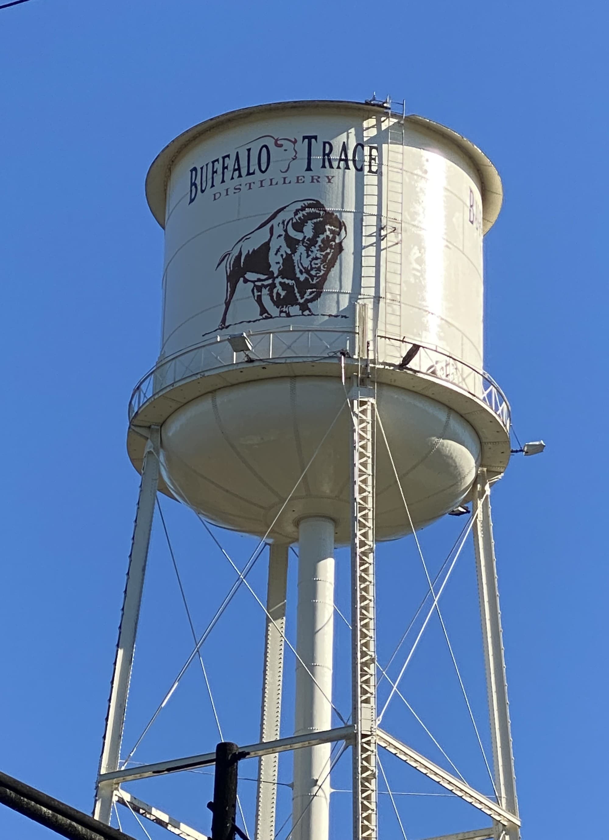 A white tank with Bourbon Trace written on it.