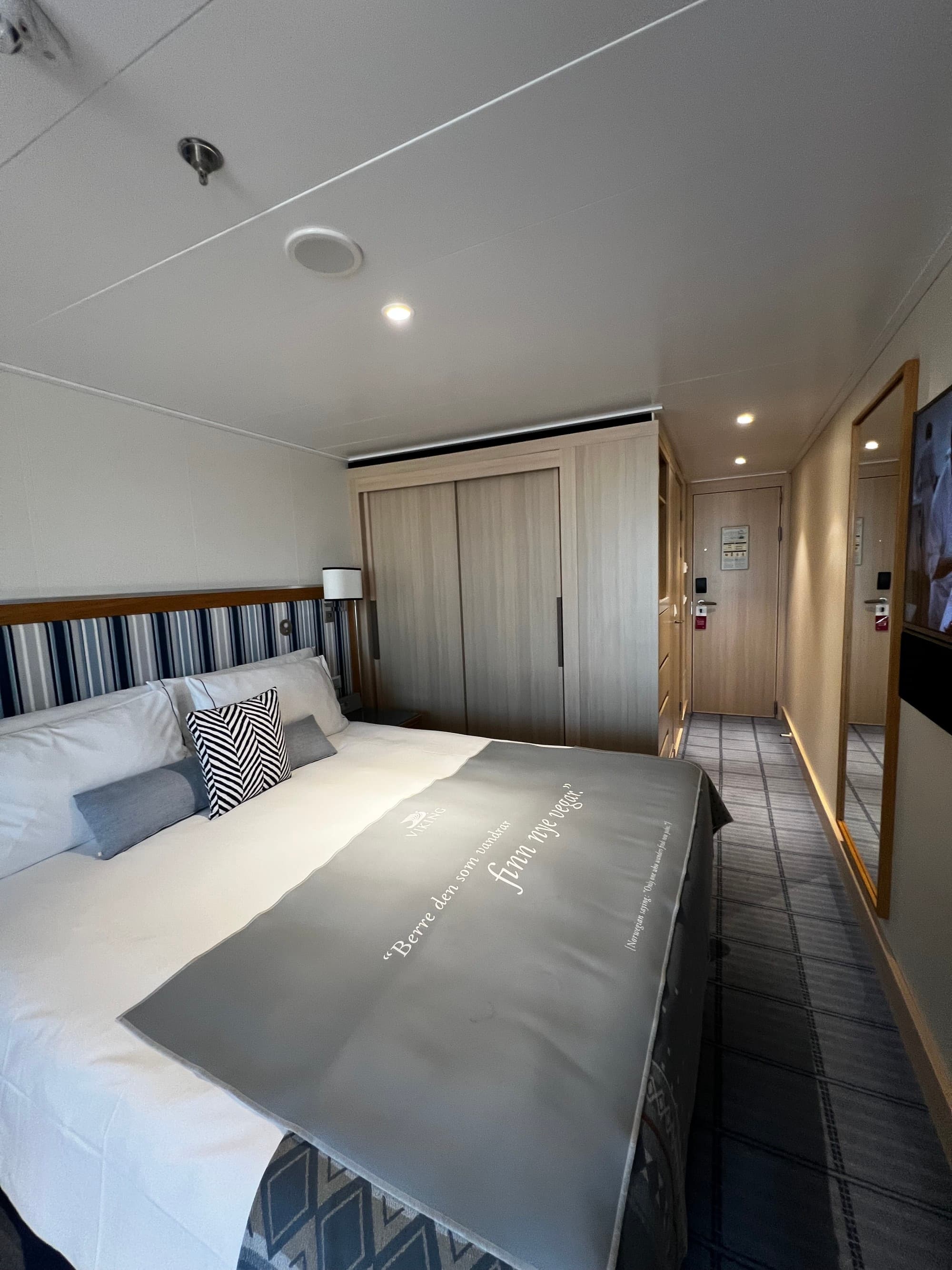 A large bed in a hotel room