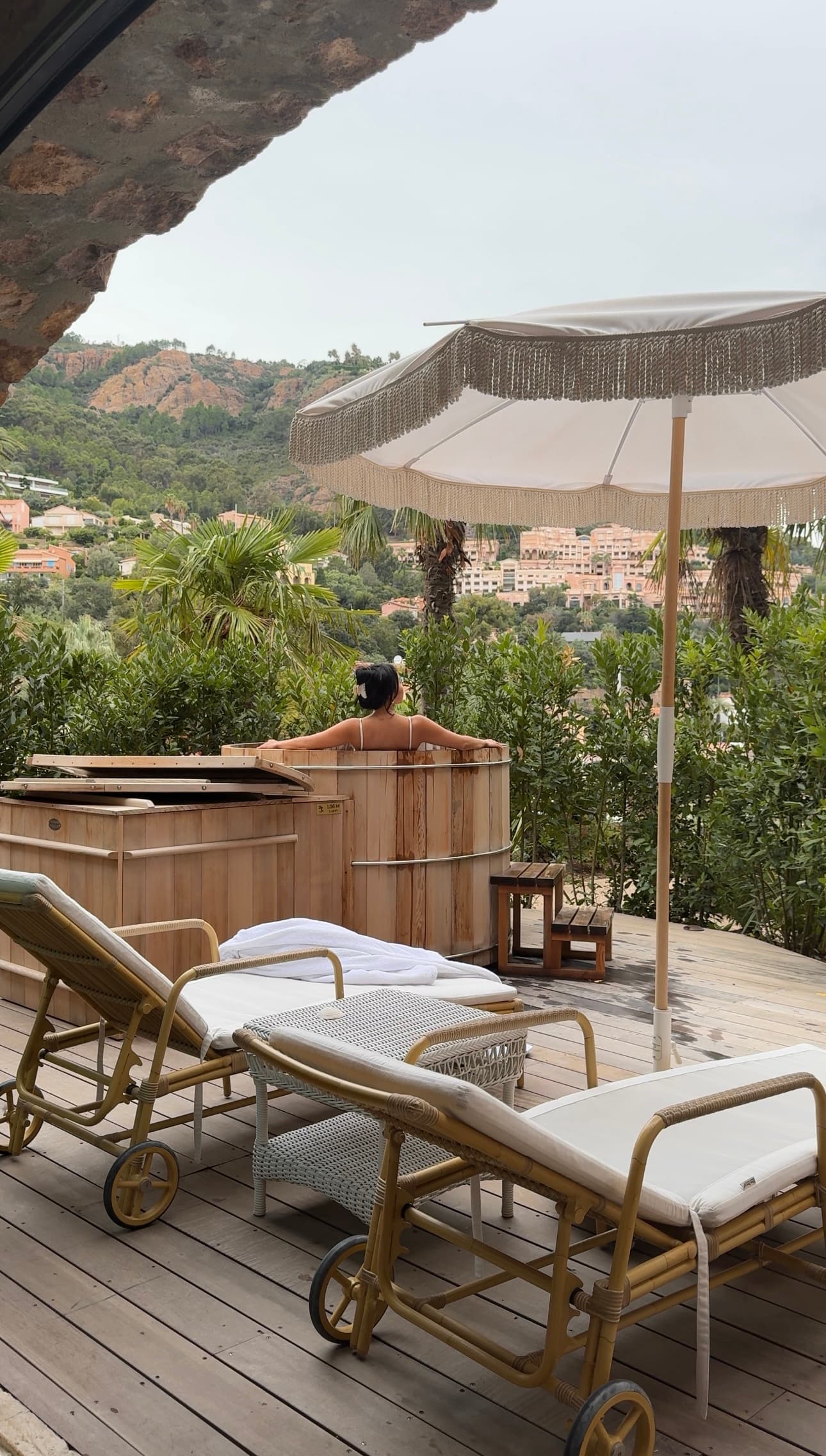 Lounge chairs on an outdoor patio during the daytime