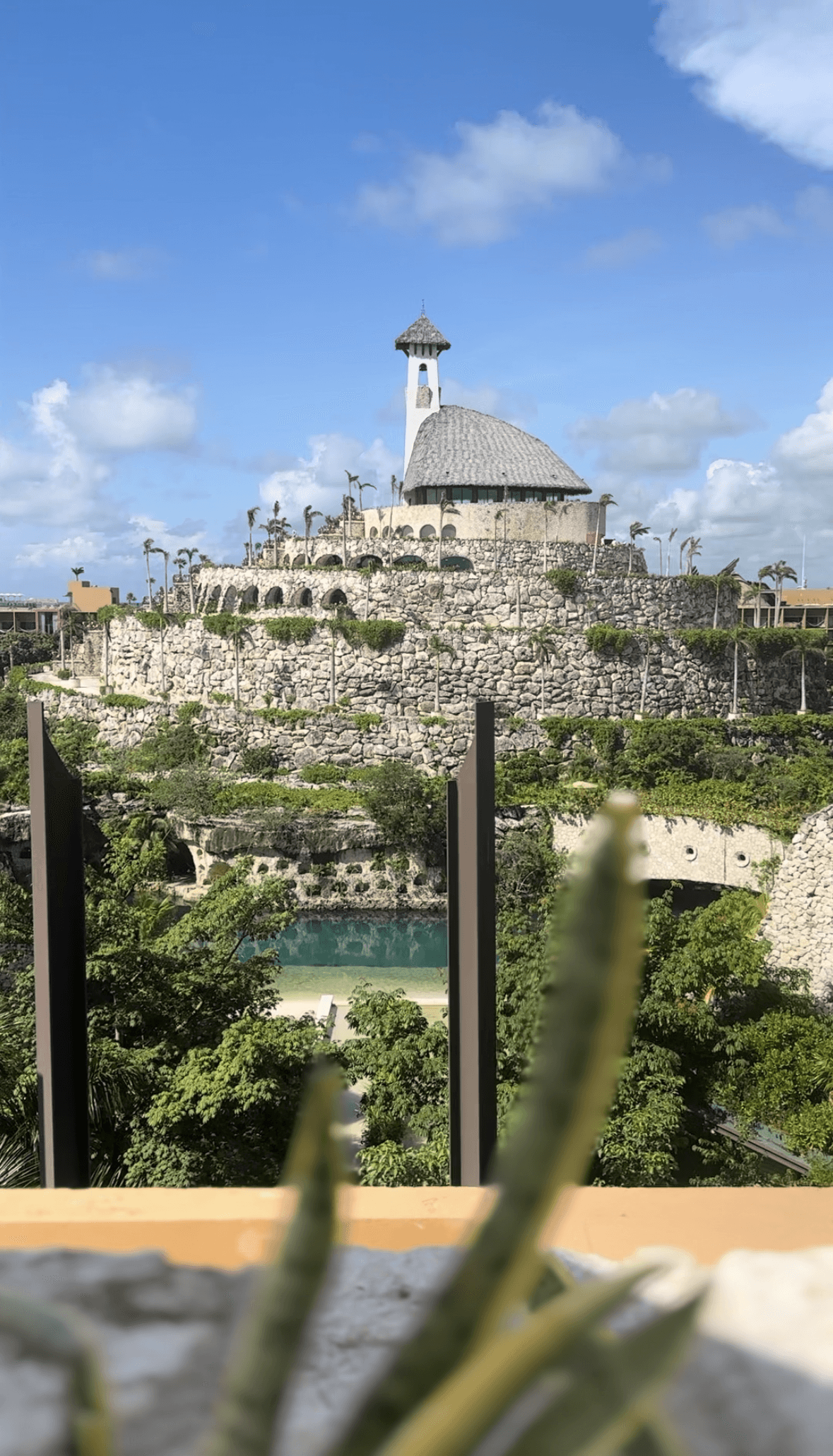 View of a building atop a hill during the daytime
