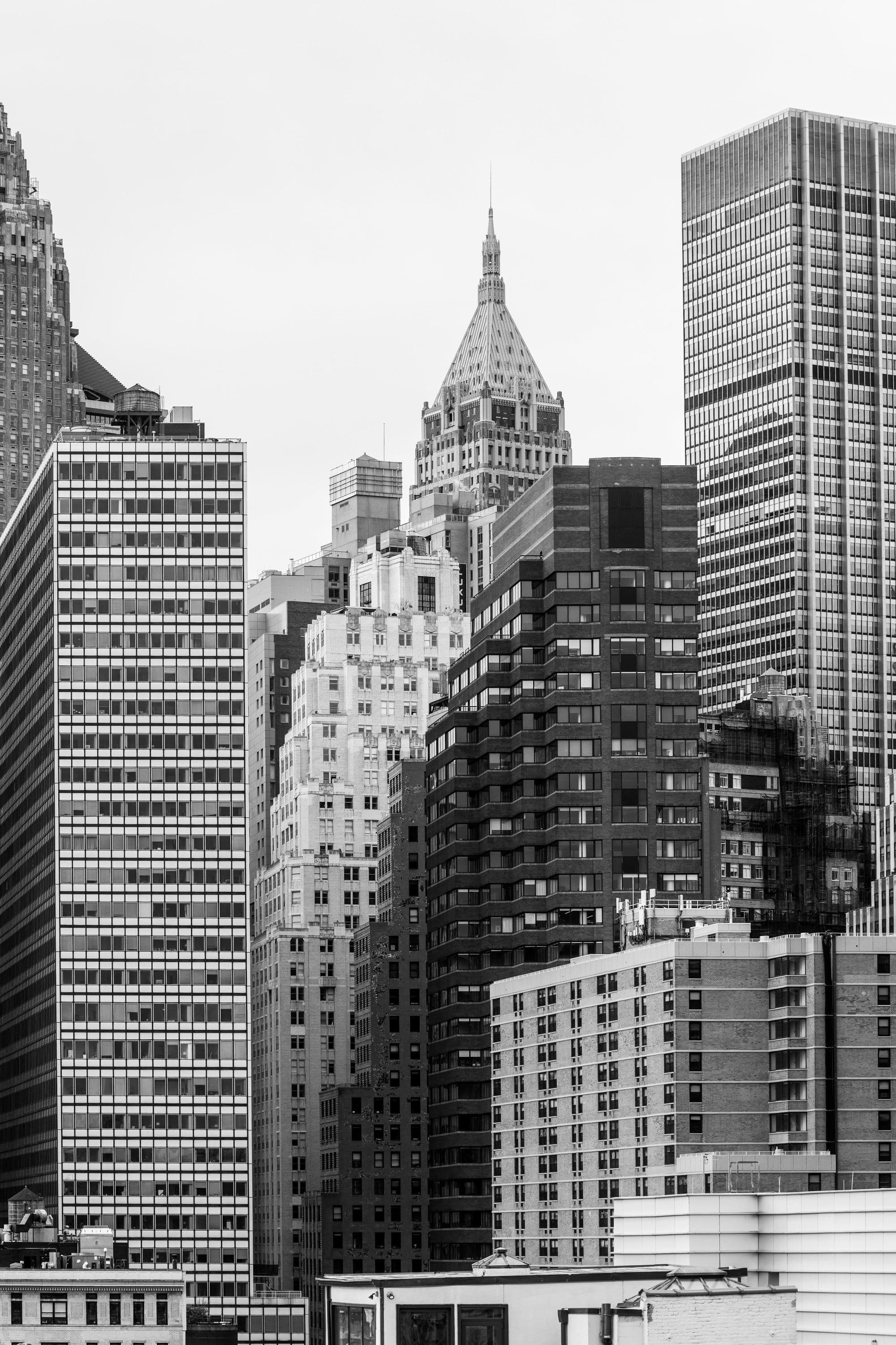 Greyscale pic of buildings.