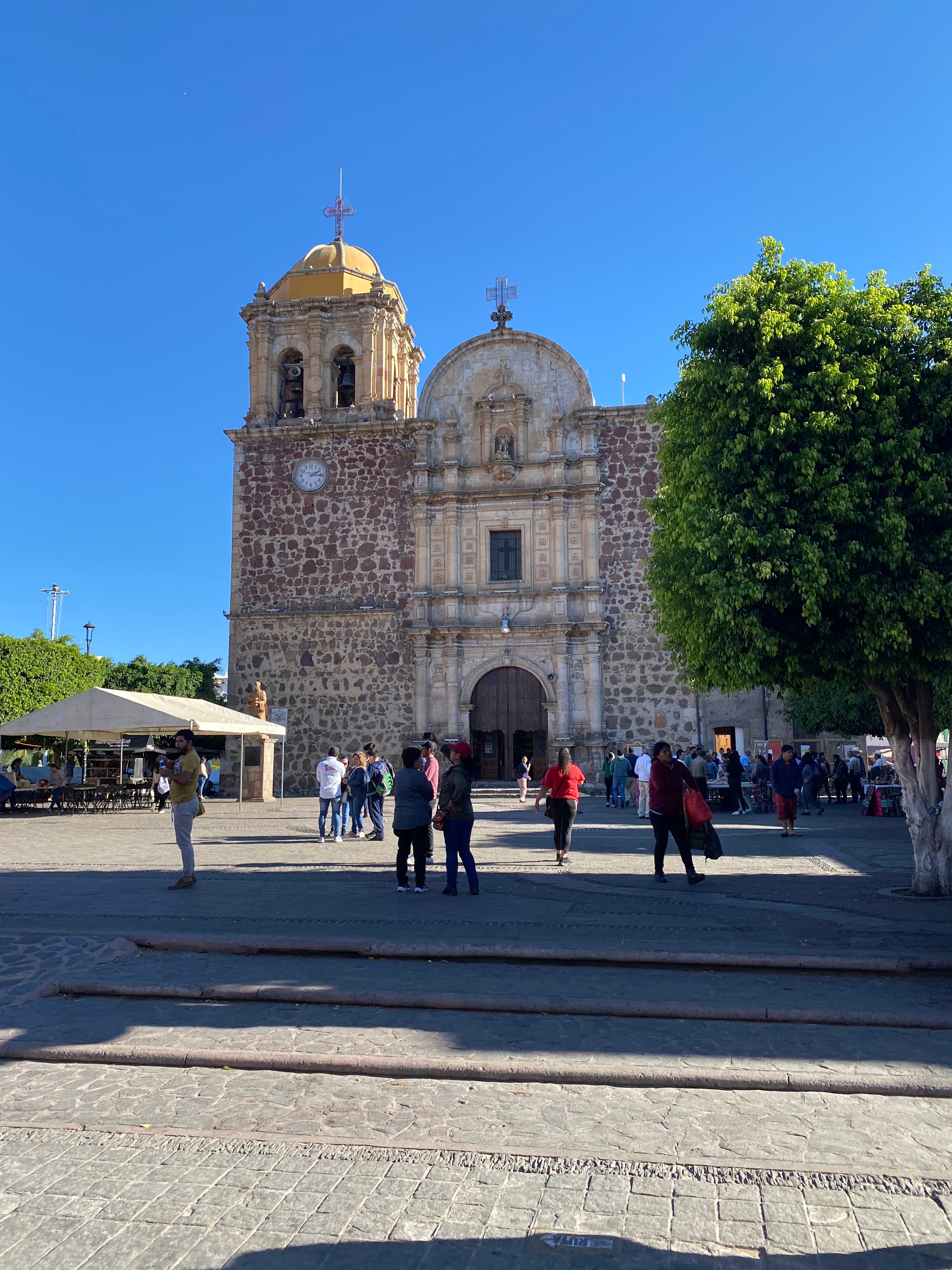 People in front of an old church.
