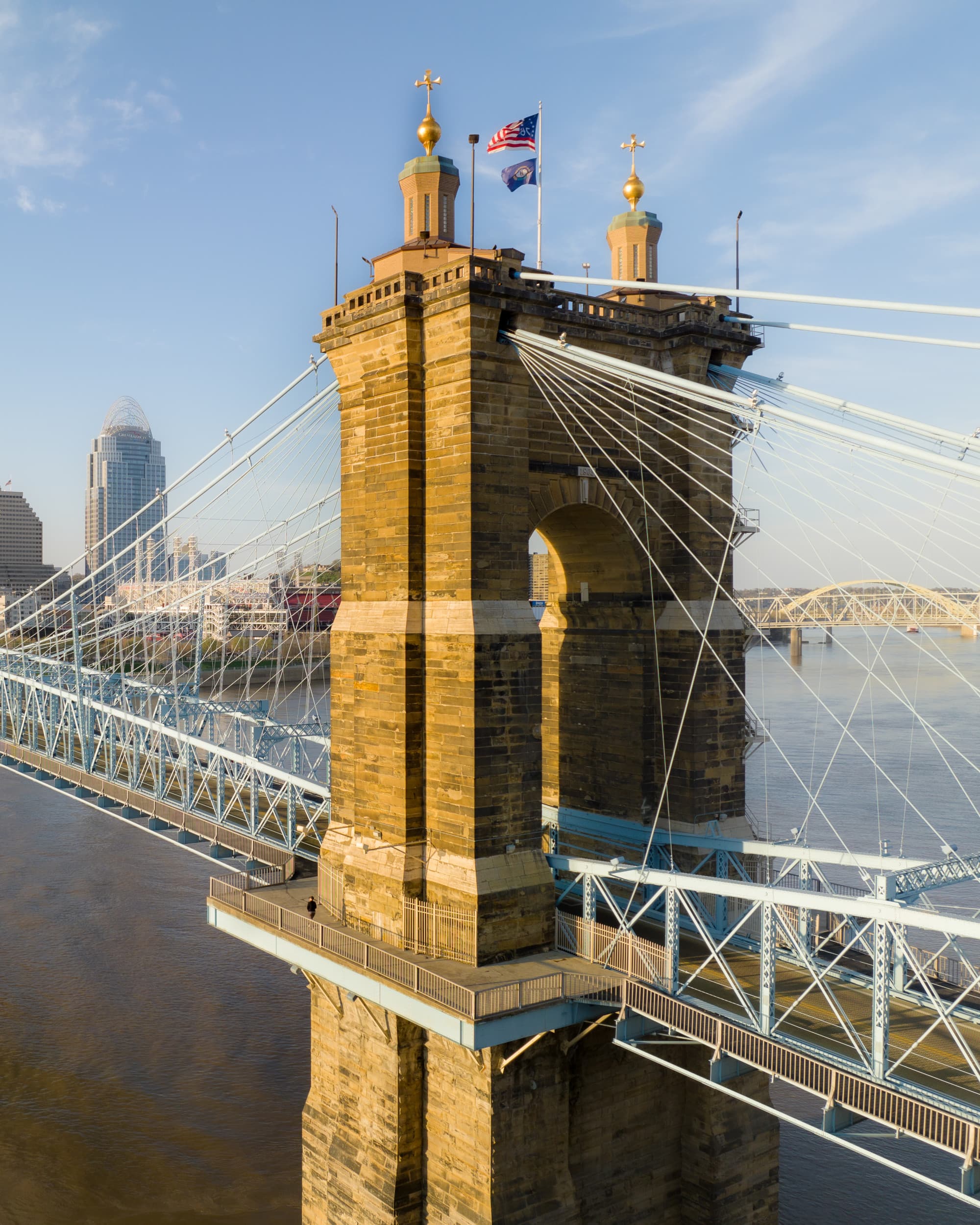 A large bridge over a body of water during the daytime