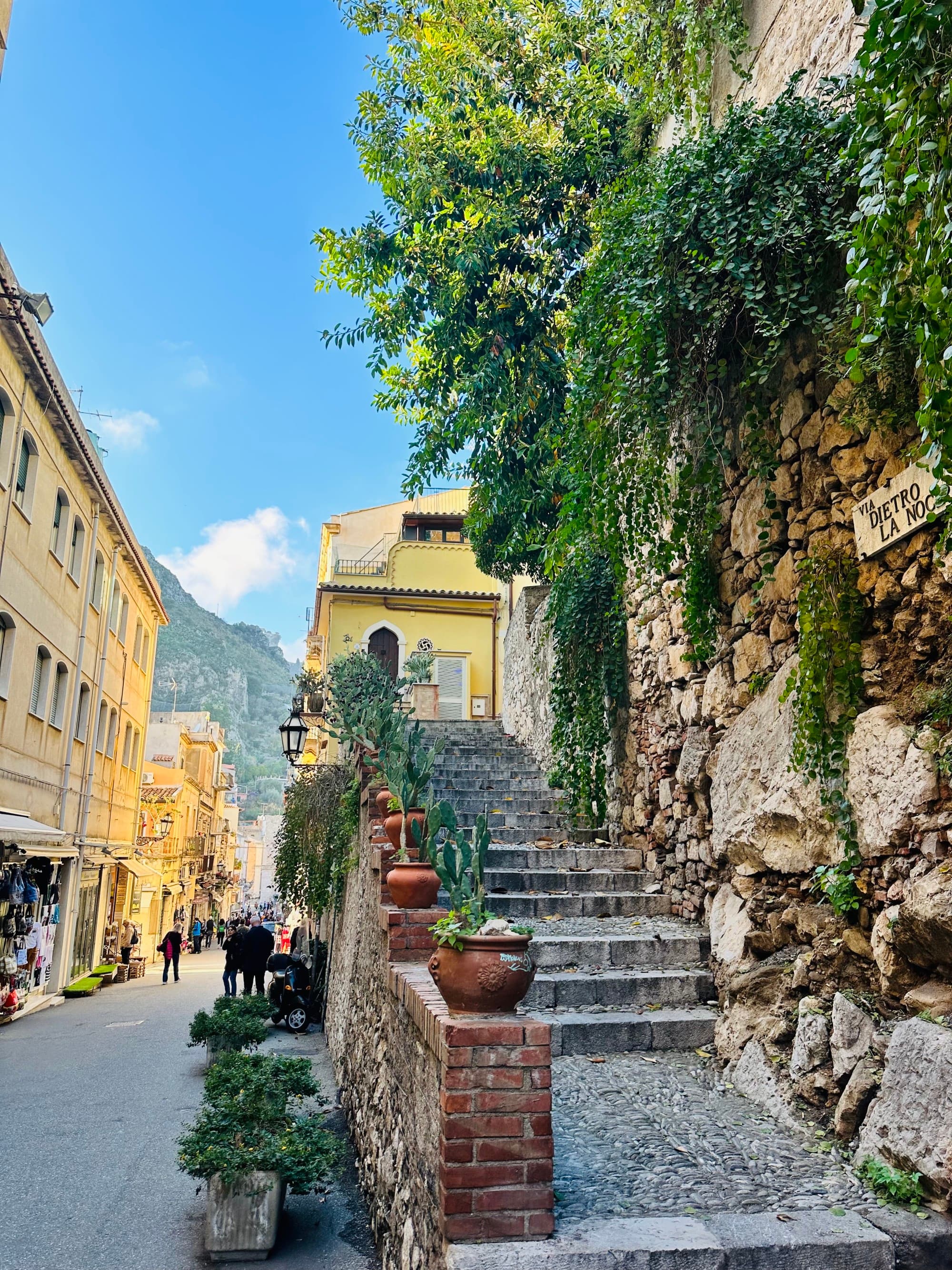 Stairs besides the street.