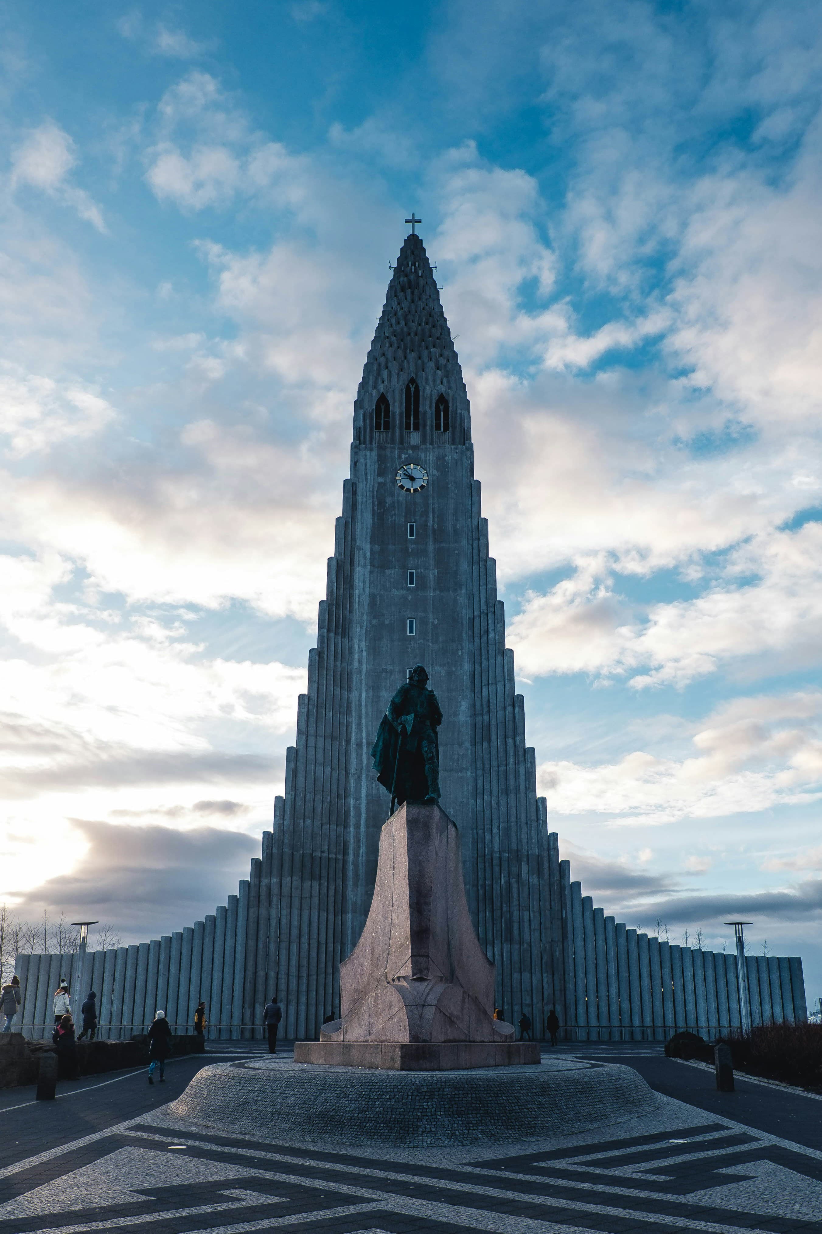 Hallgrimskirkja, a large gray concrete church set against a blue sky.