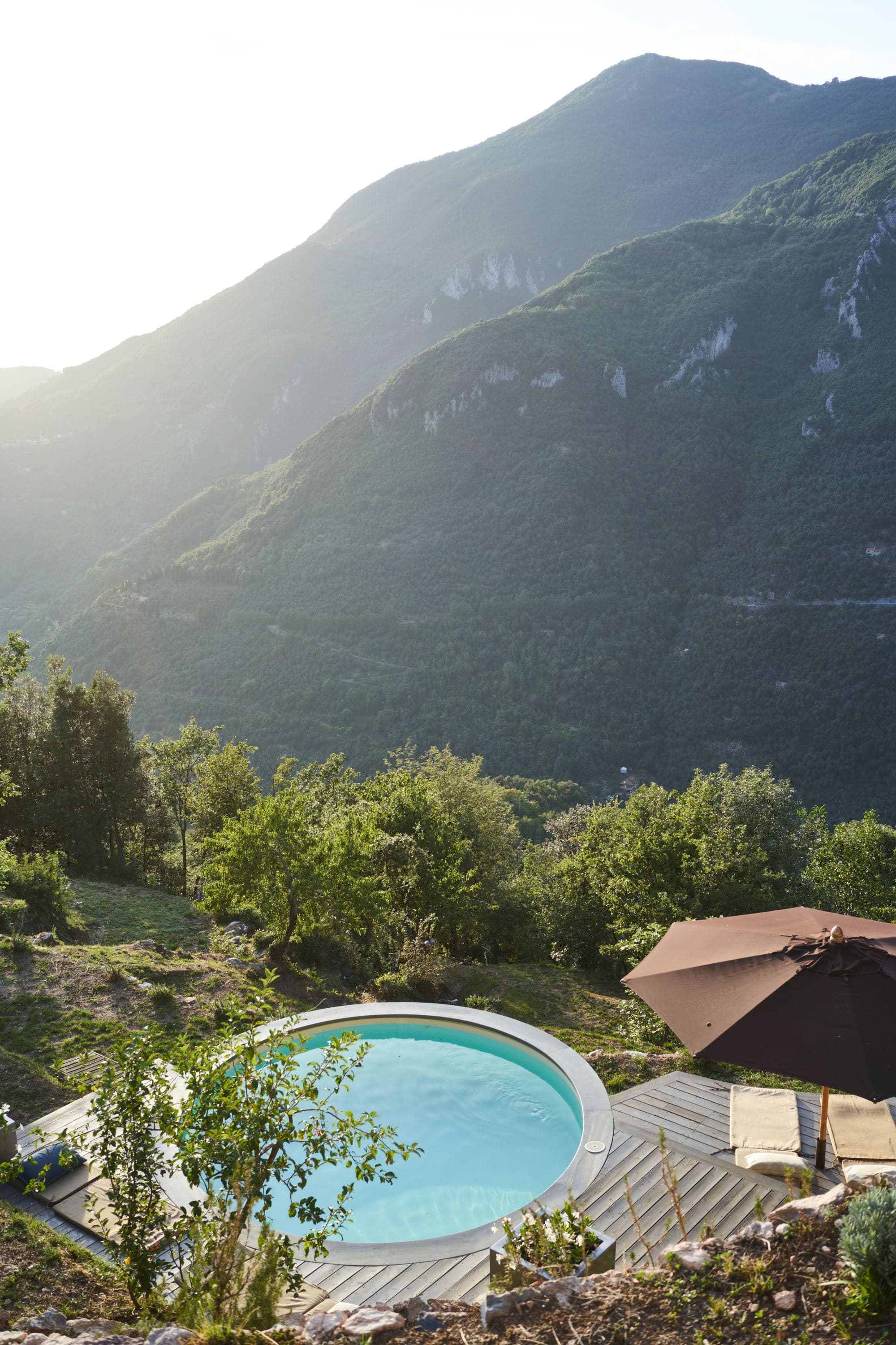 hotel with a round pool in the Italian countryside