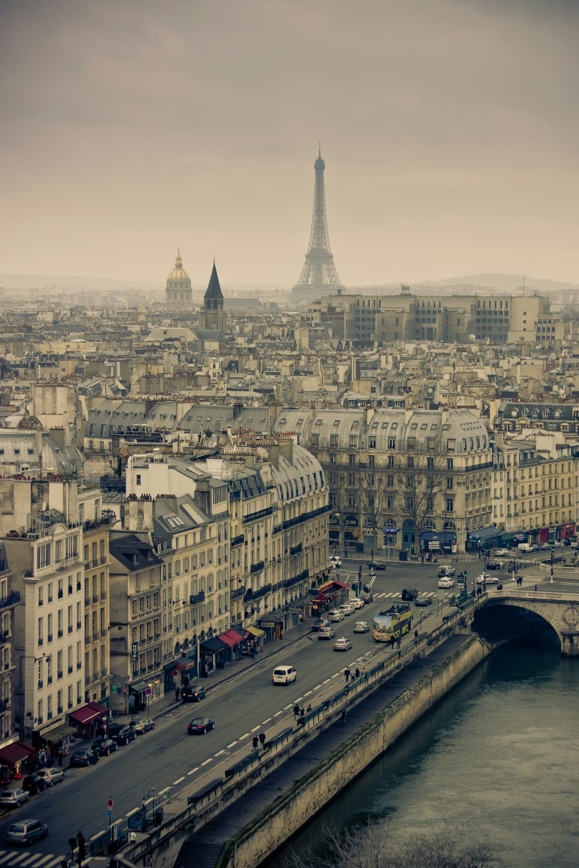The city skyline from one of Paris' 5th arrondissement hotels with the Eiffel Tower towering over in the distance.